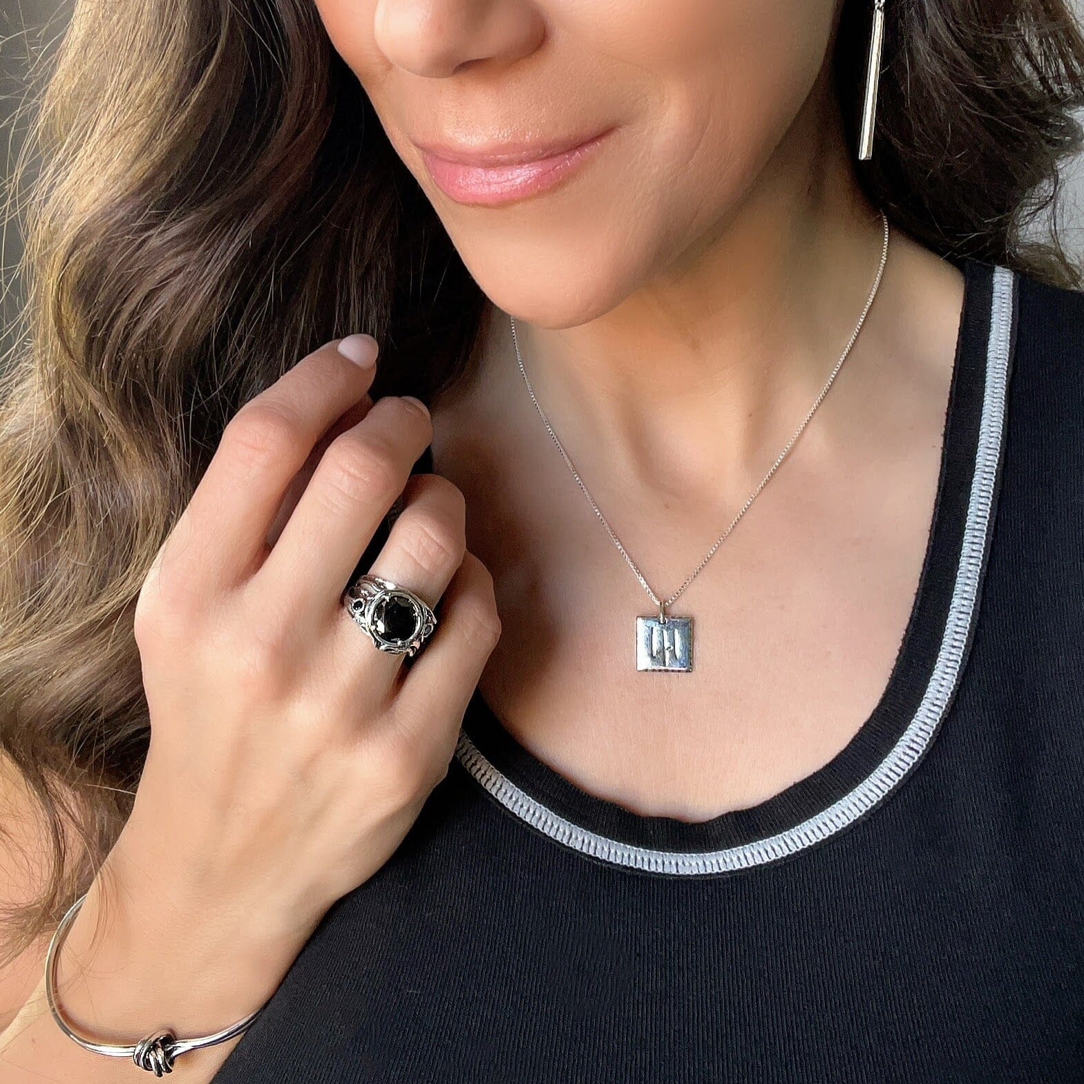 Accomplished Ring featured with 41 Necklace, Better Together Earrings, and My Knot Cuff