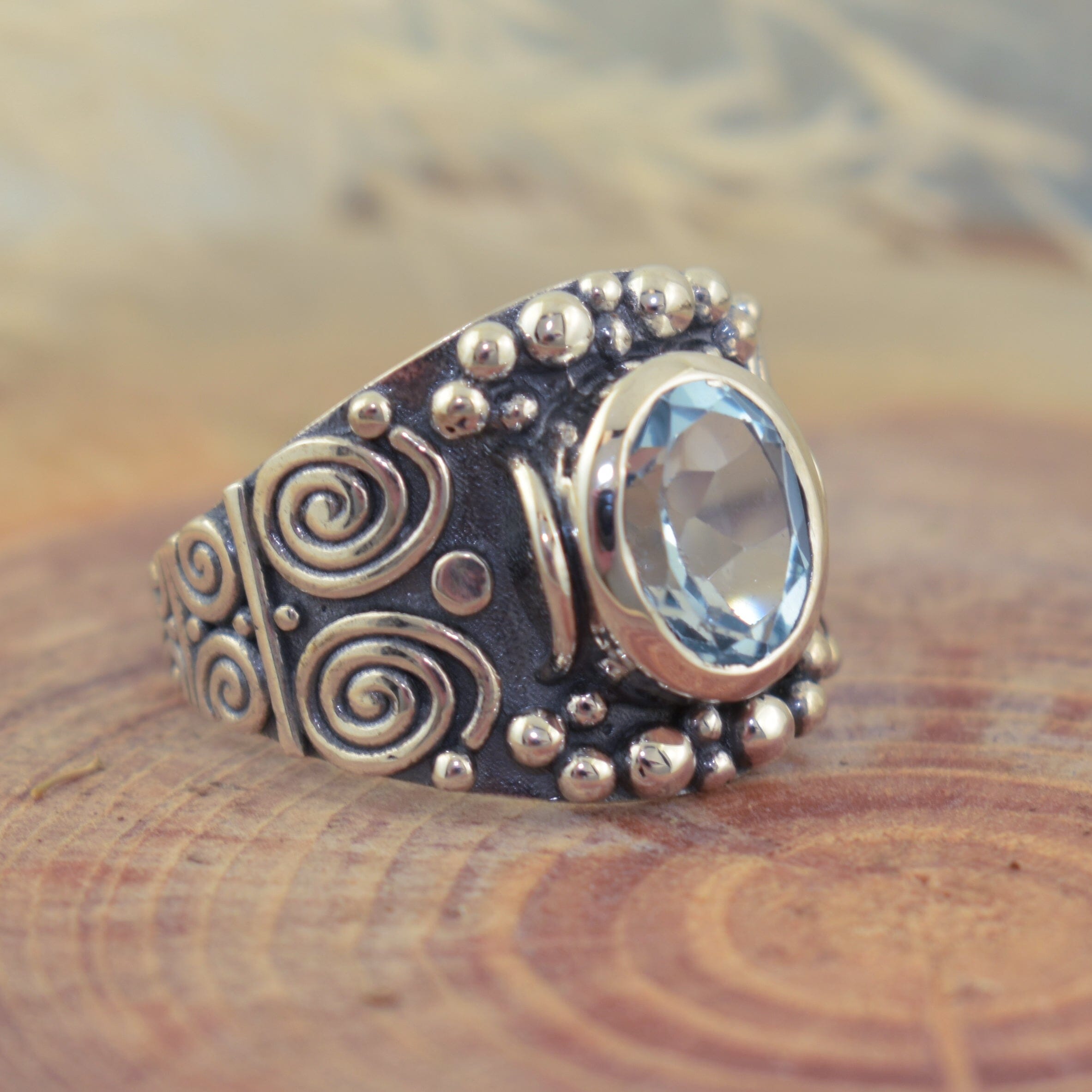 Designer sterling silver and natural blue topaz gemstone ring