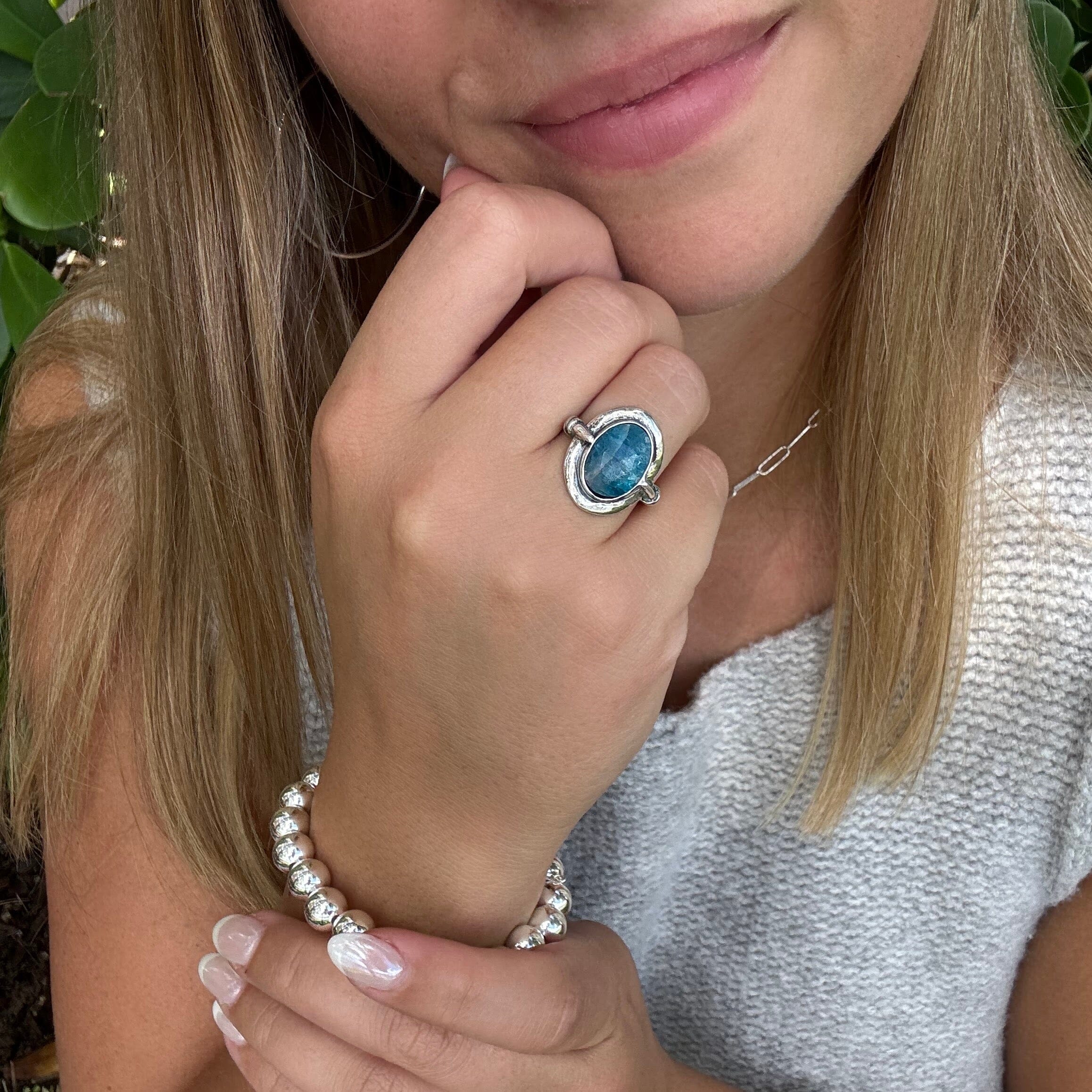 blue apatite stone bezel set in silver oval ring
