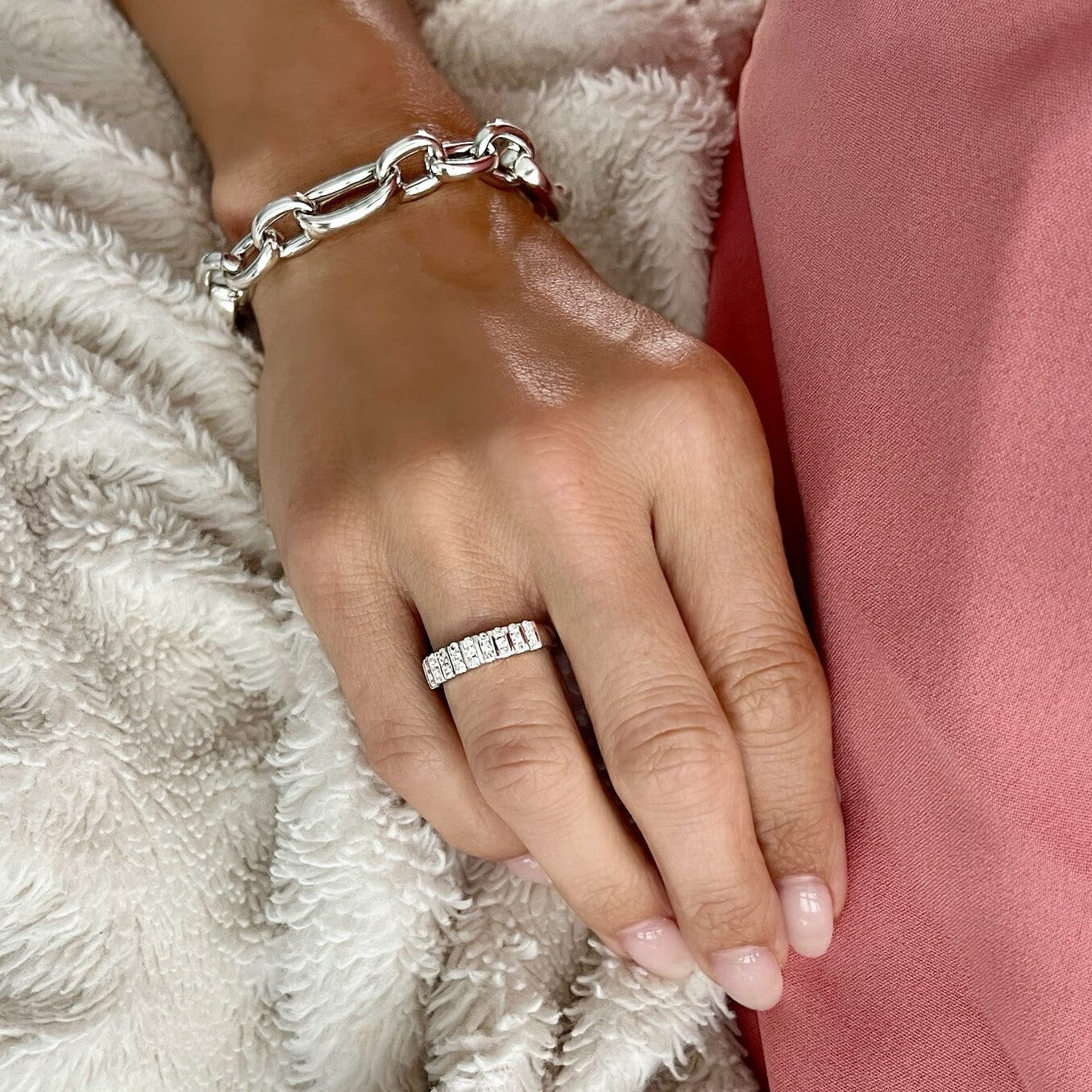 sterling silver ring with Cz stones around the band