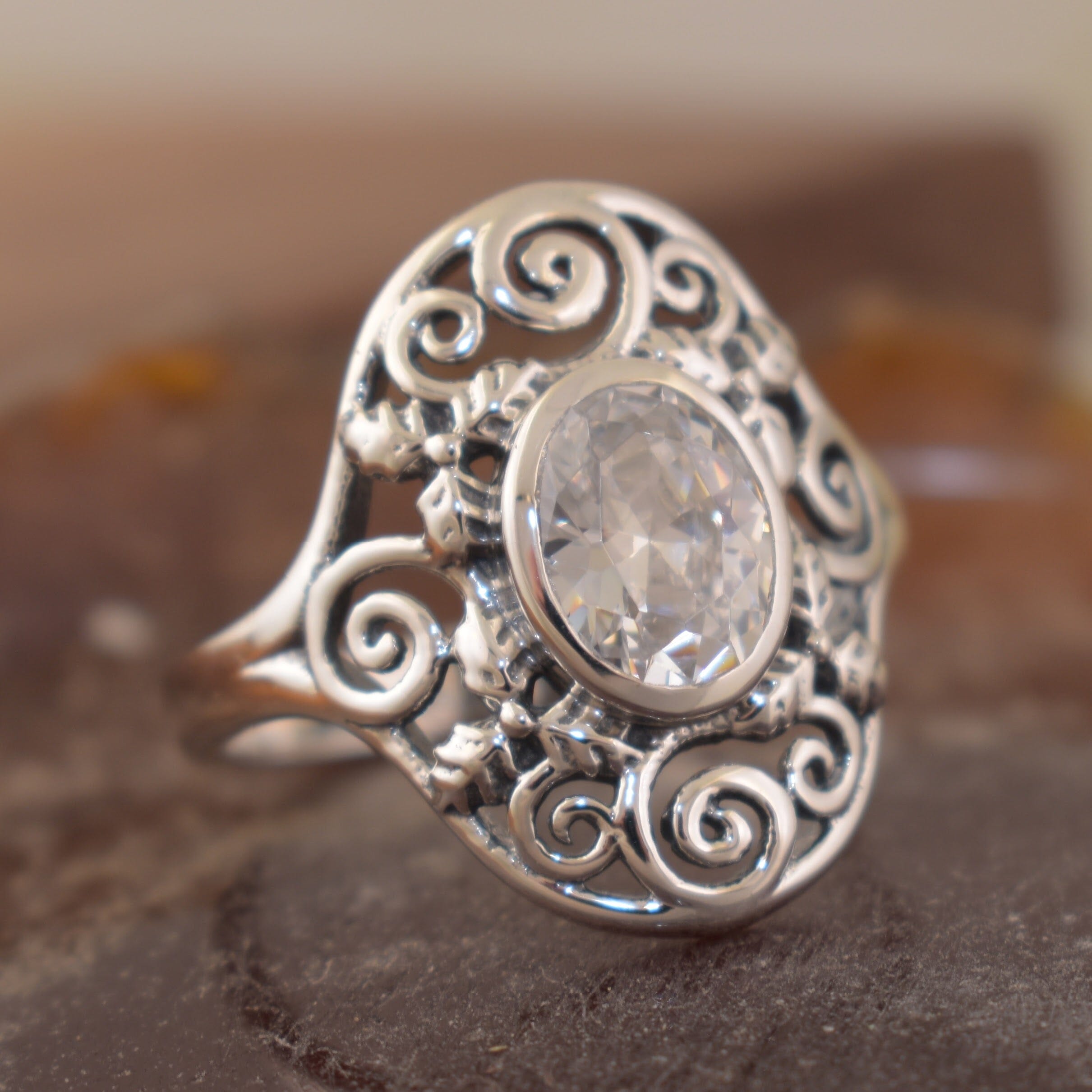 sterling silver statement ring featuring a oval cut CZ stone