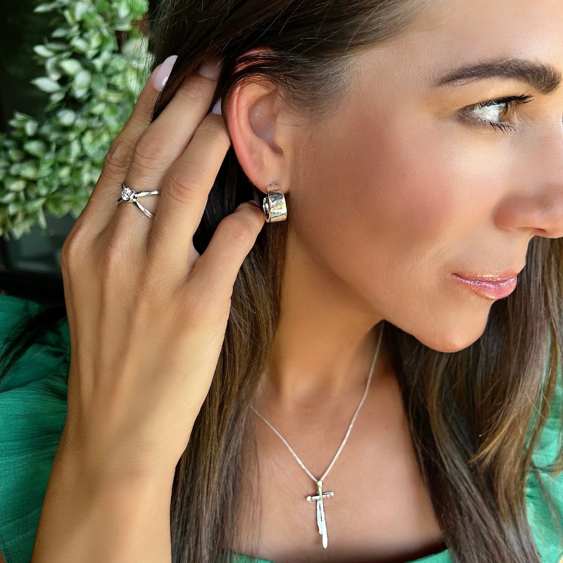 Dust and Silver hoop earrings paired with it is finished necklace and Intersect ring
