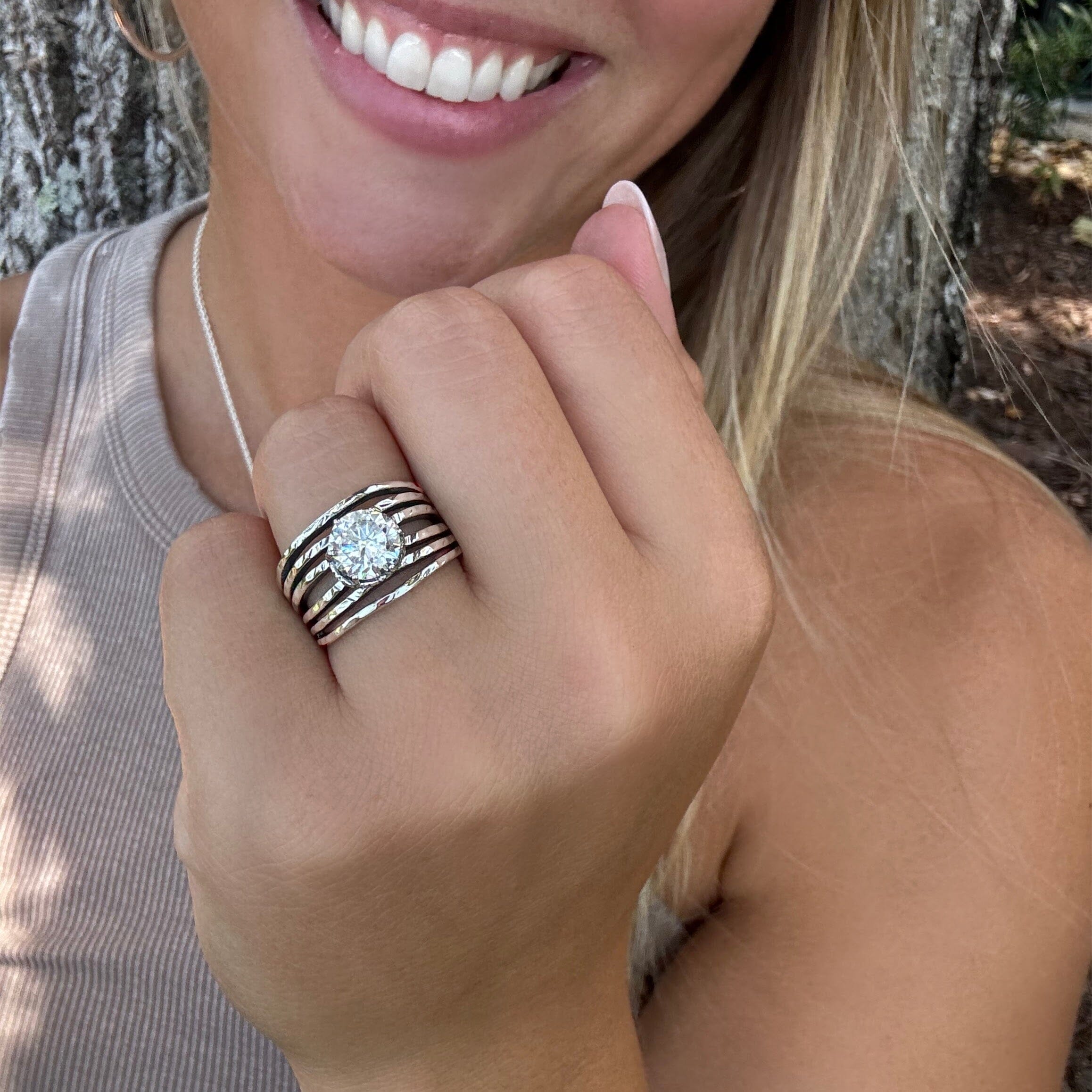 statement cz ring with 6 hammered bands on top