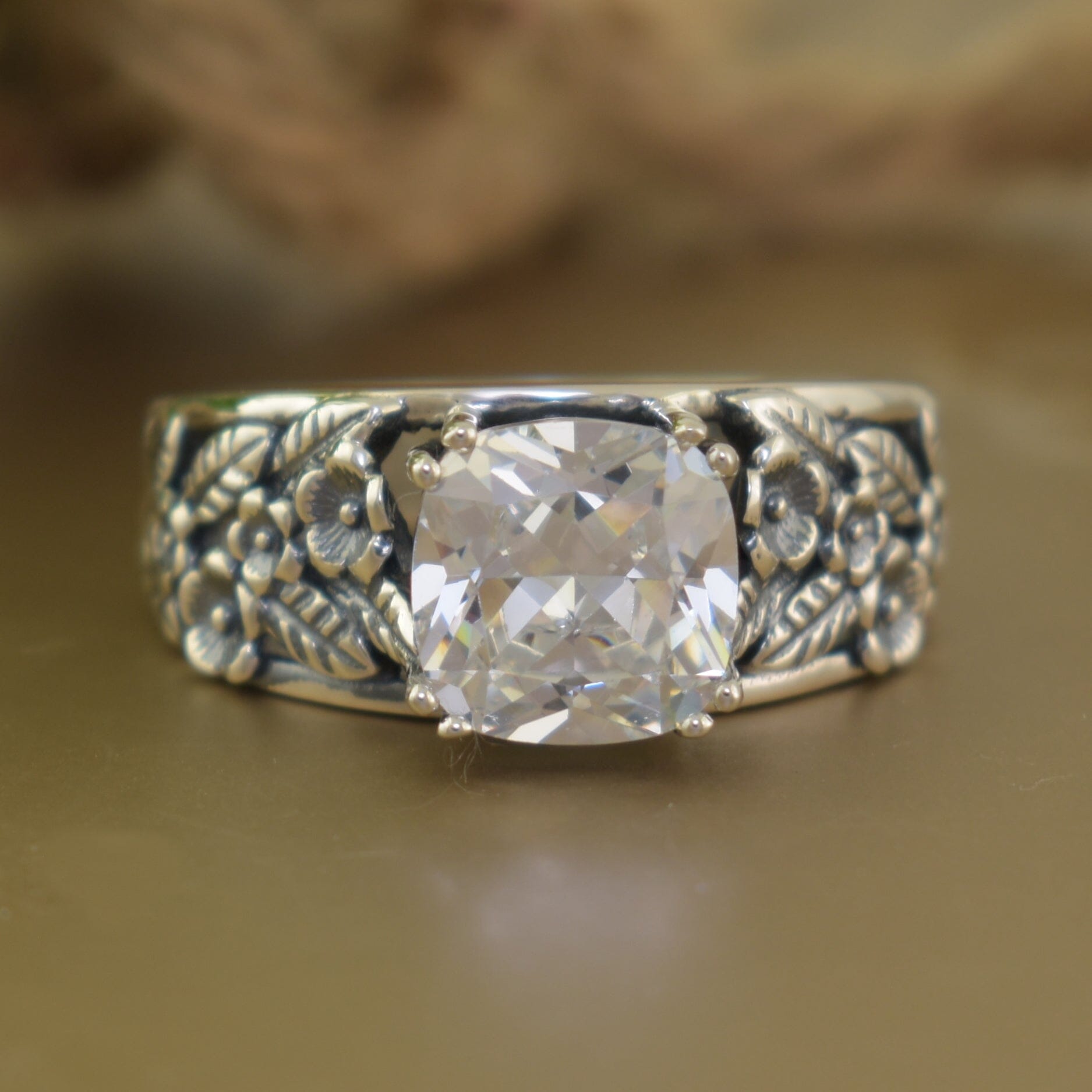 Cushion-cut cz ring set in antiqued .05 sterling silver