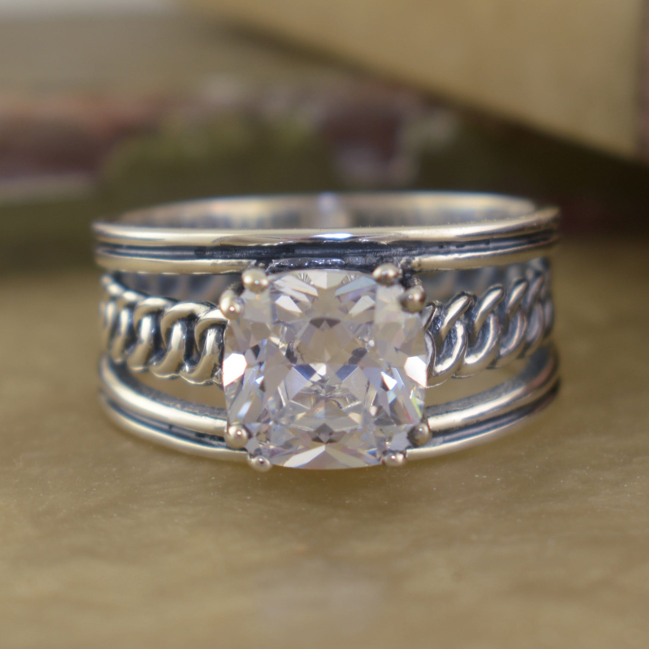 High polished  and oxidized silver with a braided center band