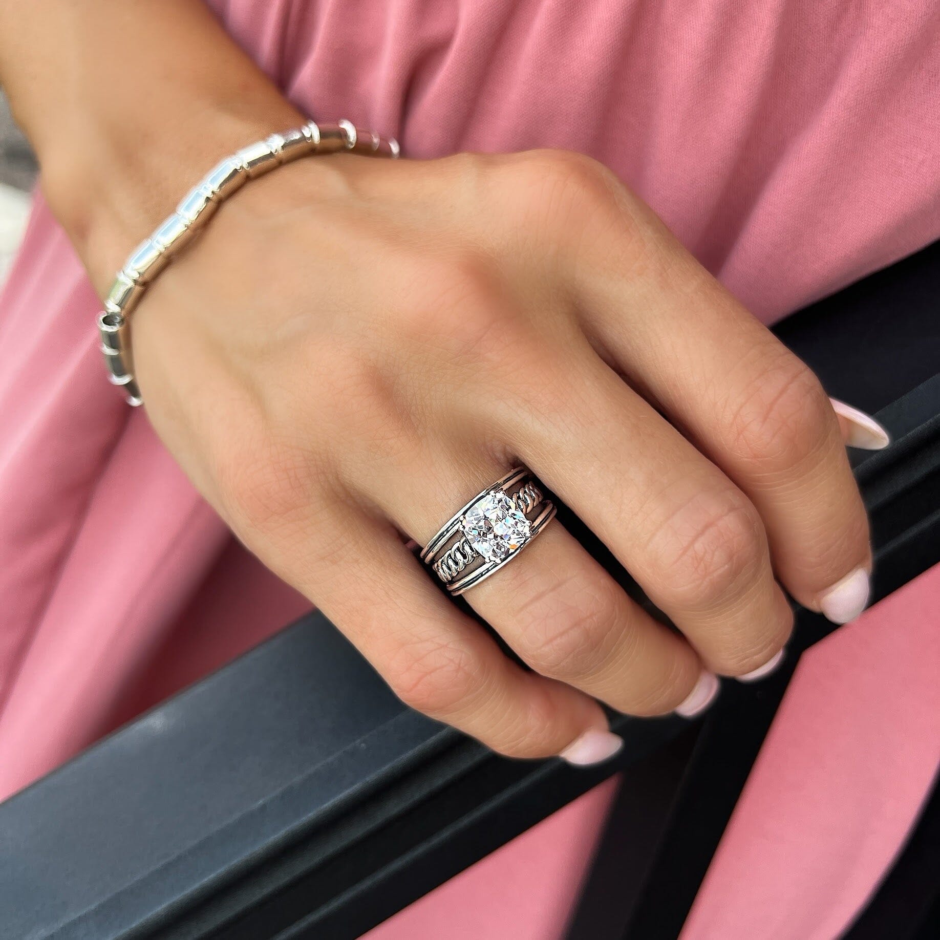 hand crafted silver ring with a prong set clear CZ stone