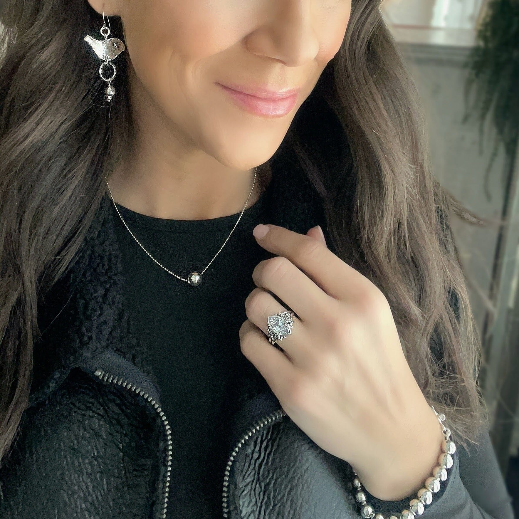 bezel set marquise CZ center stone paired with the hav'n a ball bracelet , up- tempo necklace and up away earrings