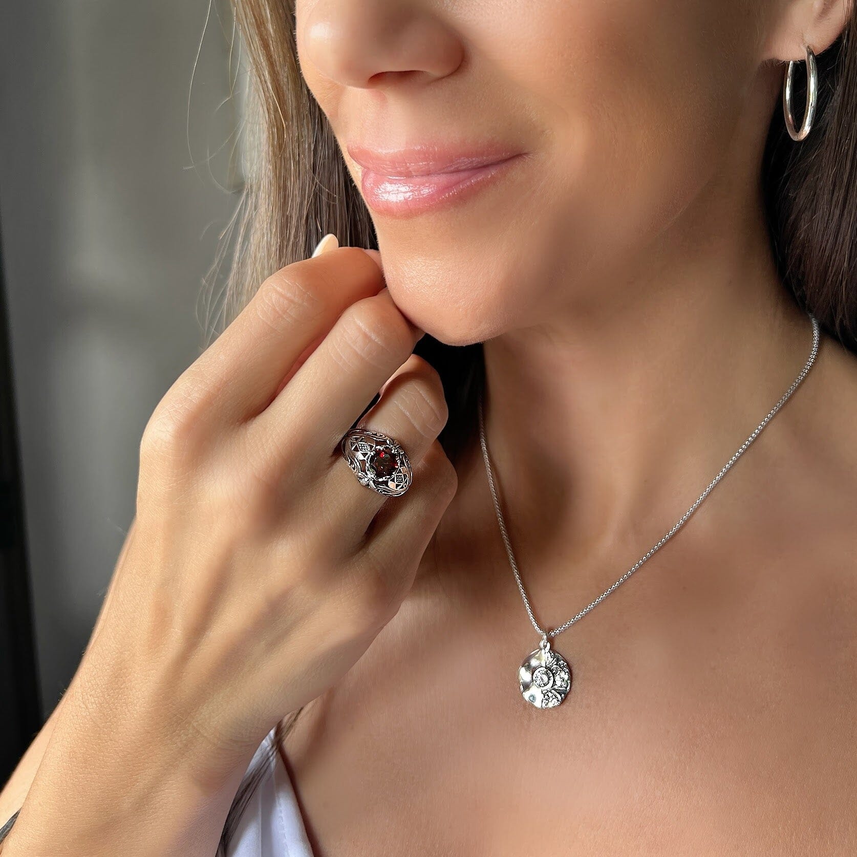 Joyfolie Retro ring paired with Cliff Hanger earrings and better half necklace