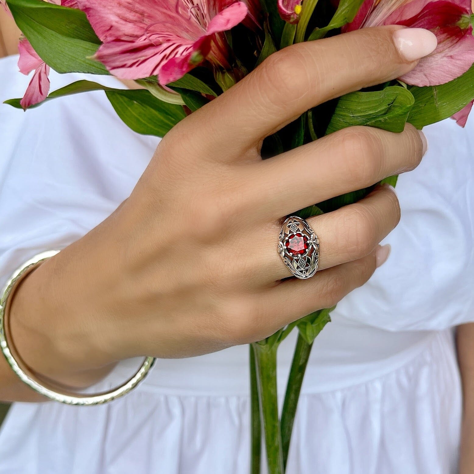 handcrafted statement ring featuring a Garnet stone