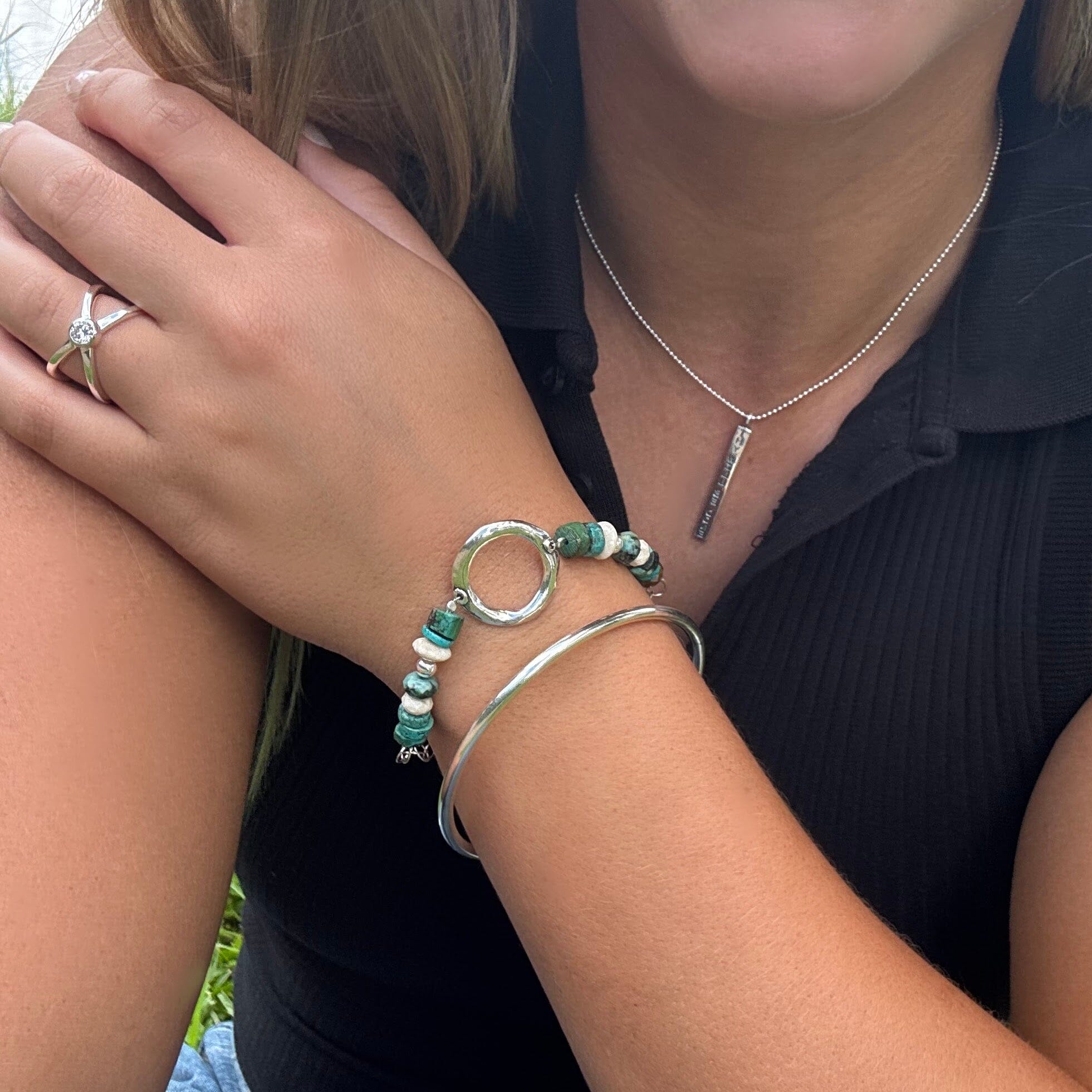 Sterling silver hand crafted bracelet with a turquoise bracelet