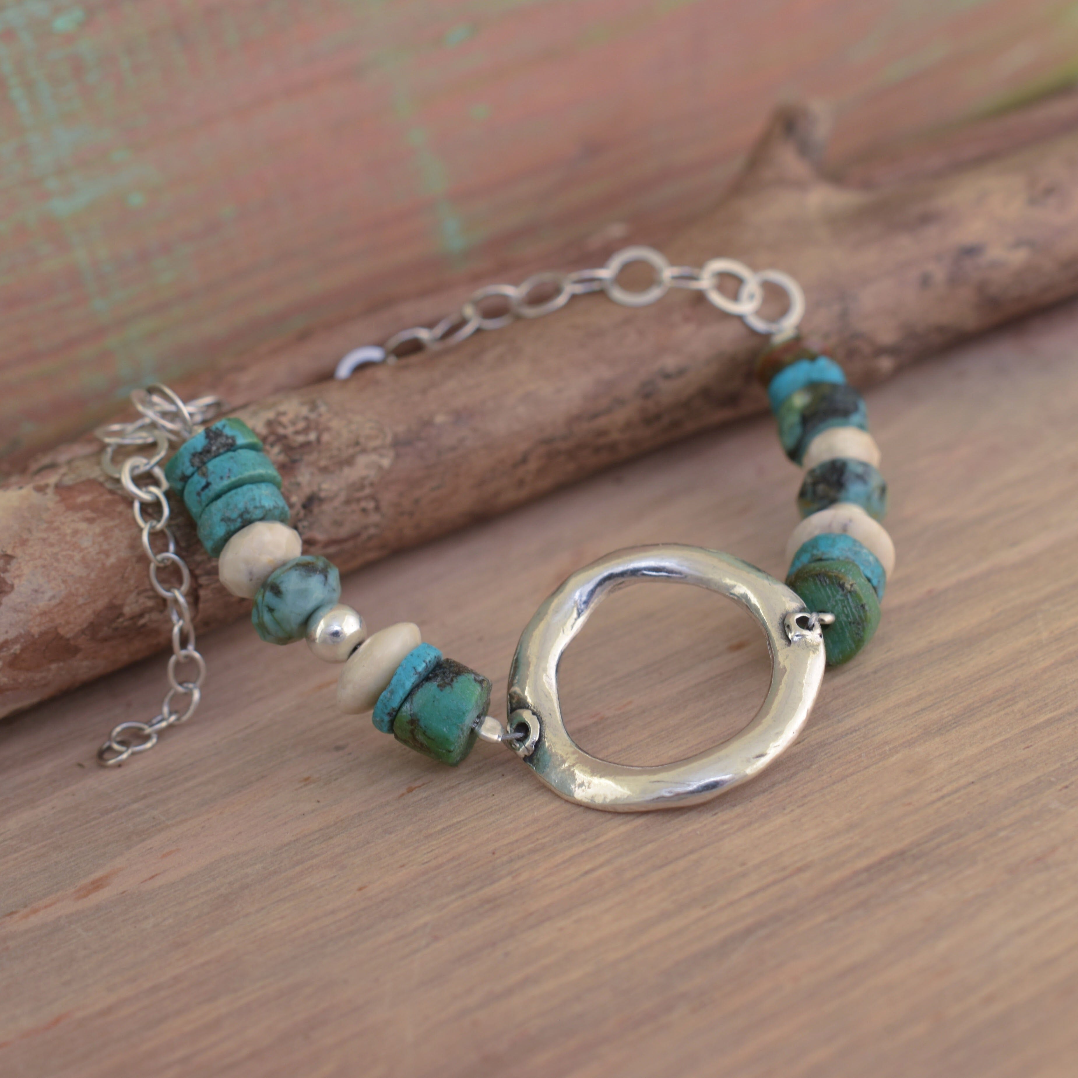 turquoise bracelet with a silver circle in the center