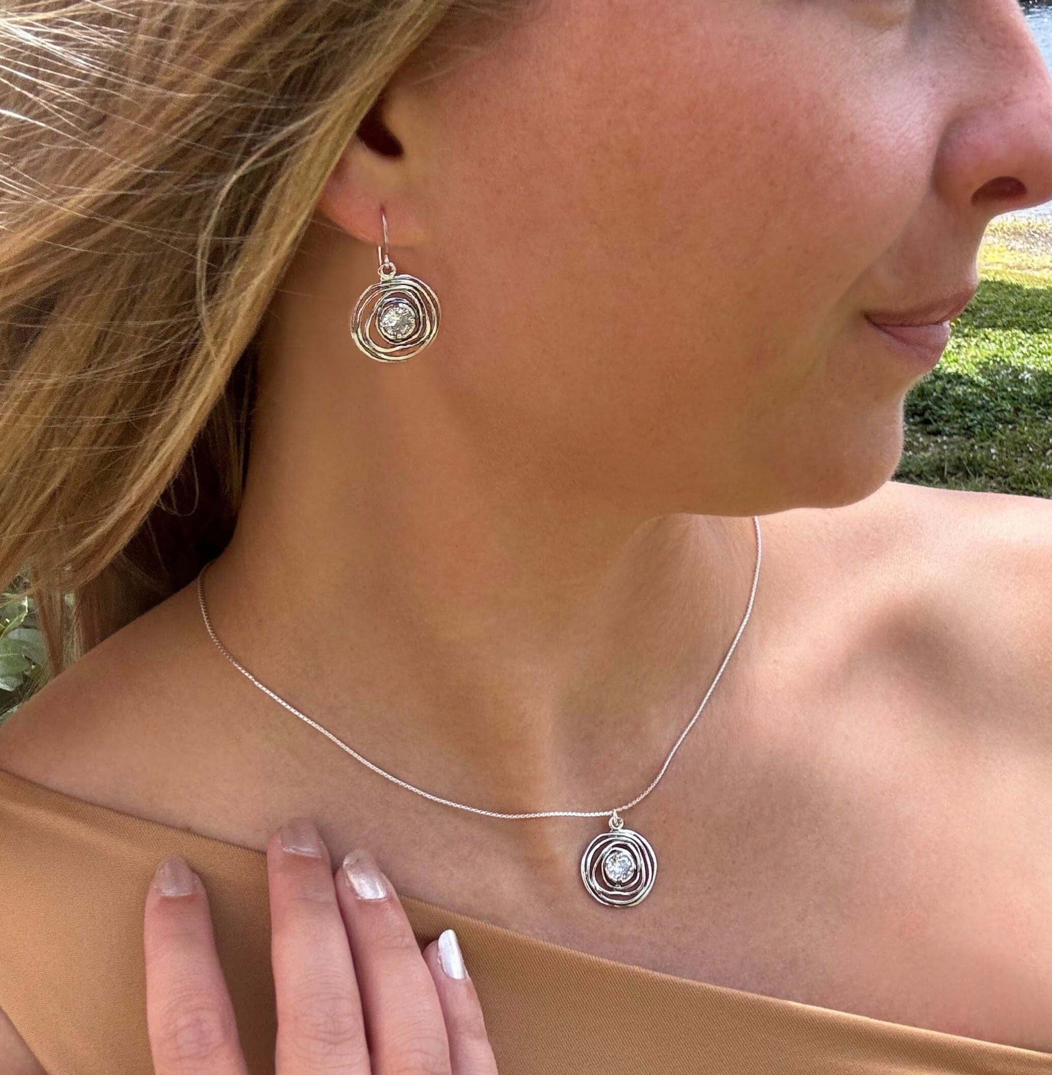 matching organic wavy New Crown Jewel necklace and earrings