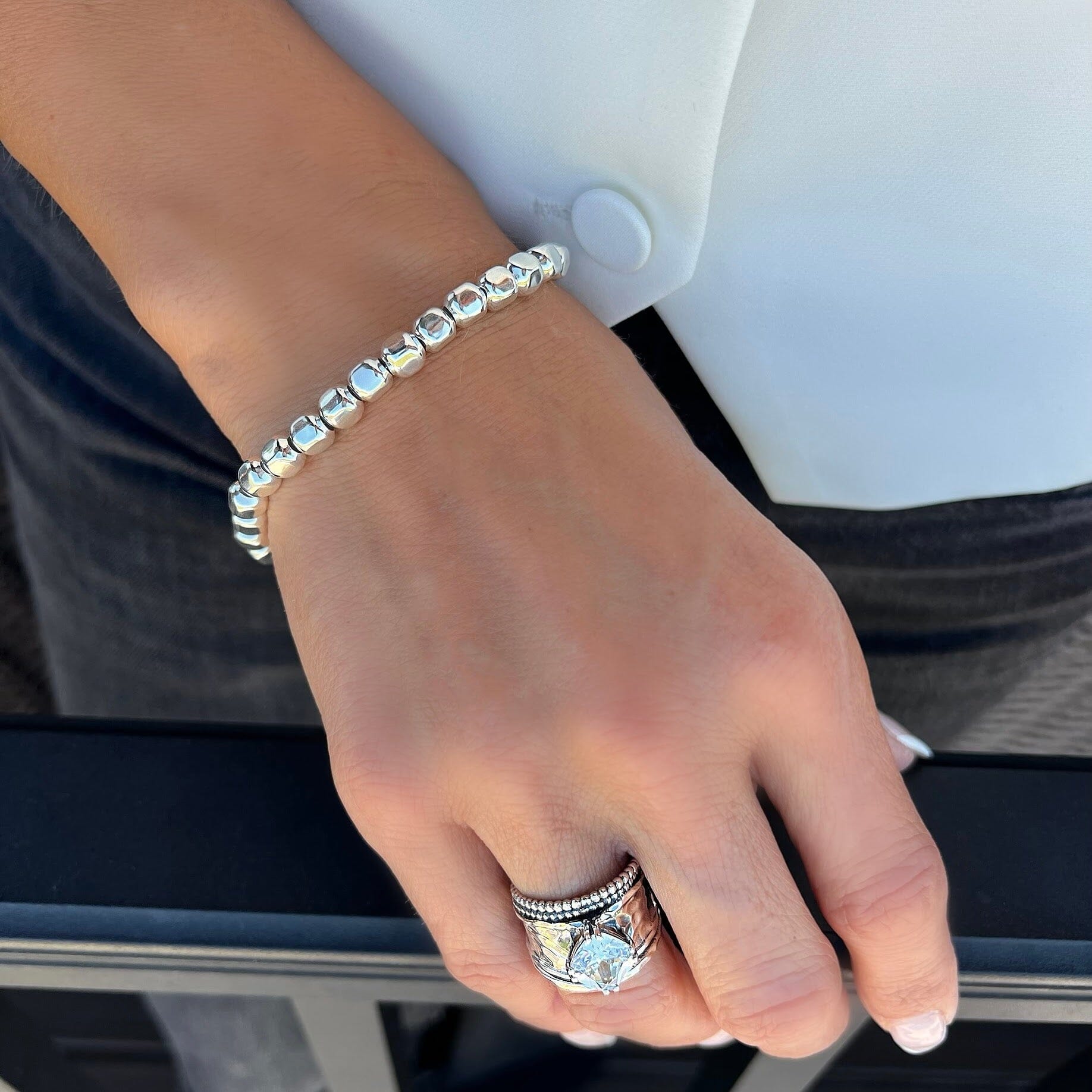 pebble parade bracelet paired with the grandstand ring