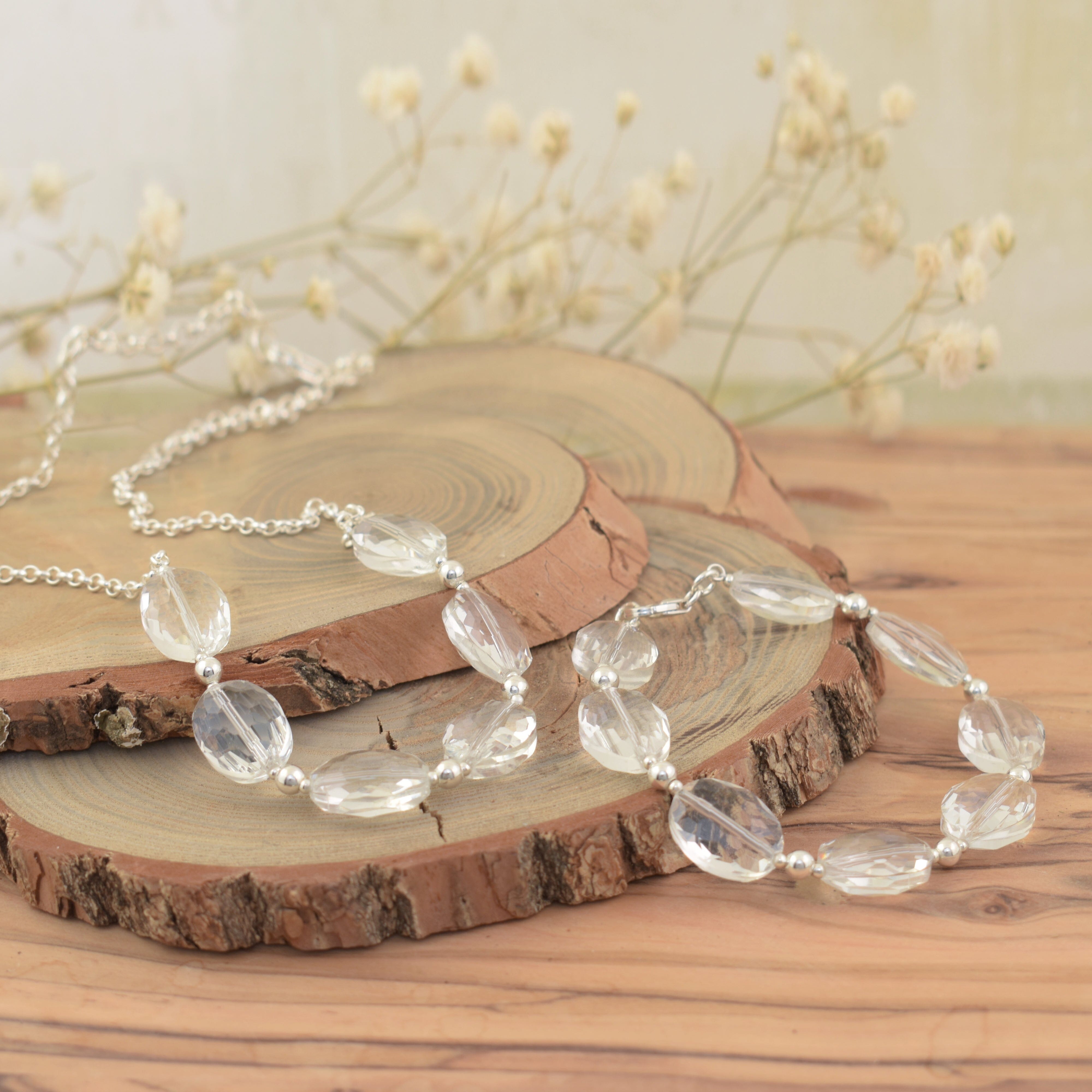 Matching Pizzazz Necklace and Bracelet featuring oval crystal and .925 sterling silver