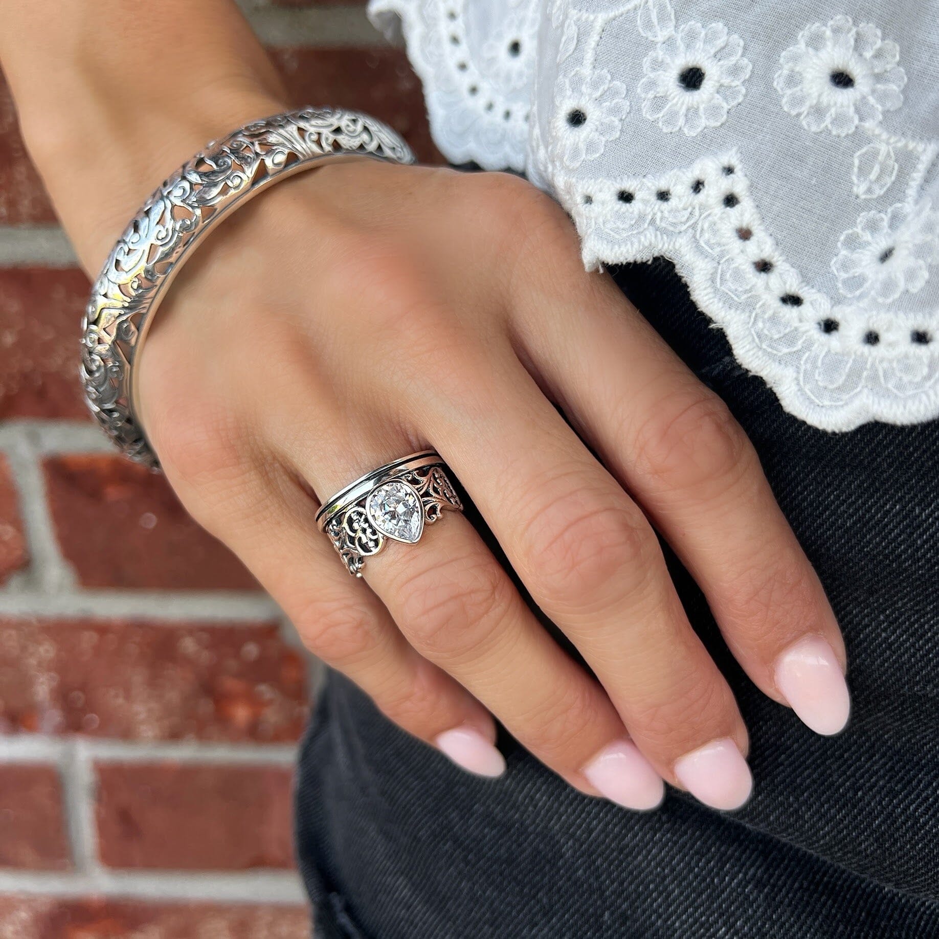 sterling silver hand crafted ring with a bezel set CZ stone