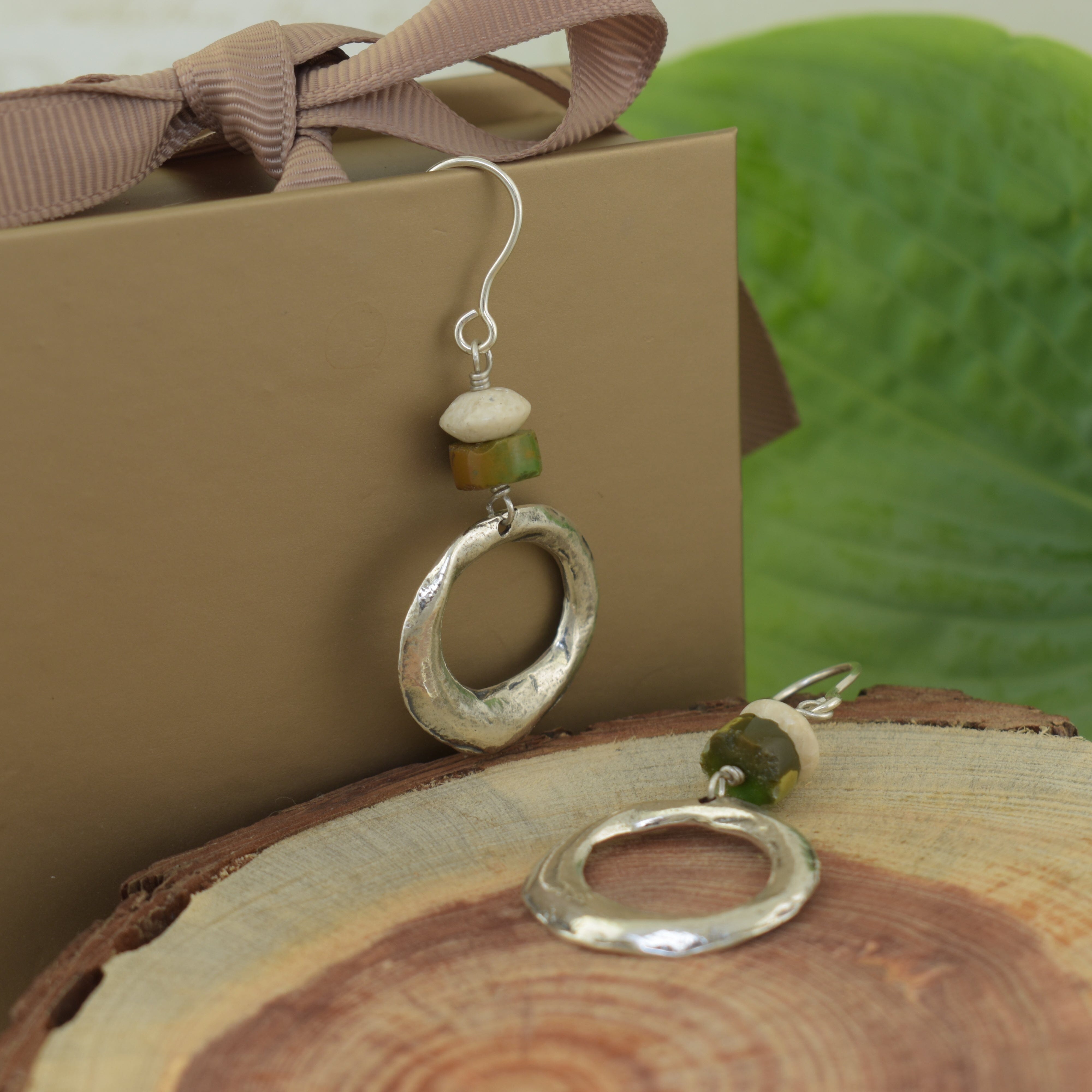 Circular sterling silver earrings featuring River-Stone and Turquoise stones