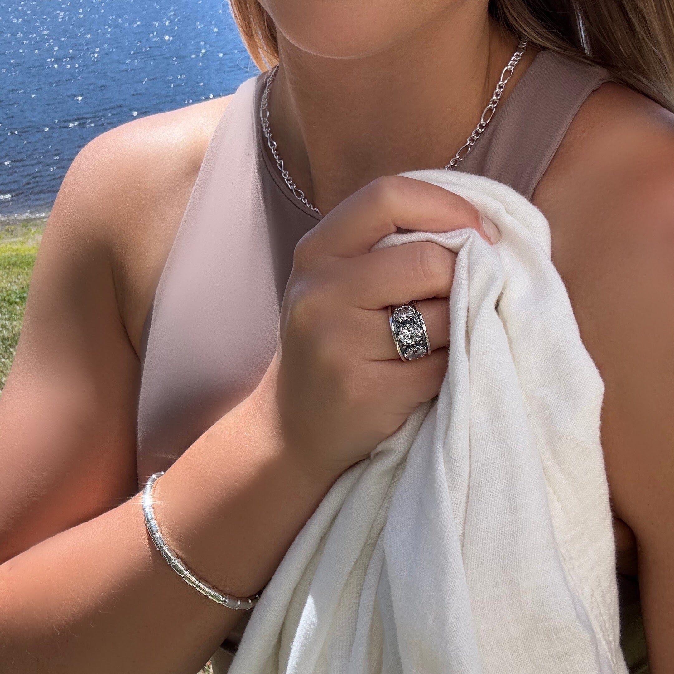 .925 silver handcrafted band featuring 3 cz stones paired with fab figaro necklace and tubettini bracelet