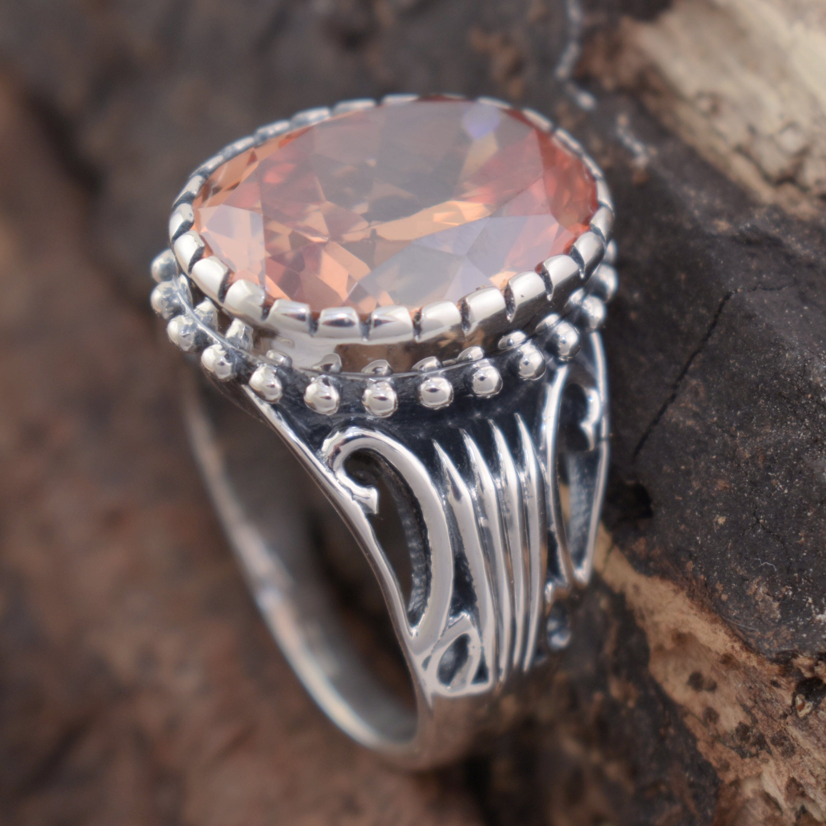 Designer sterling silver and champagne stone ring