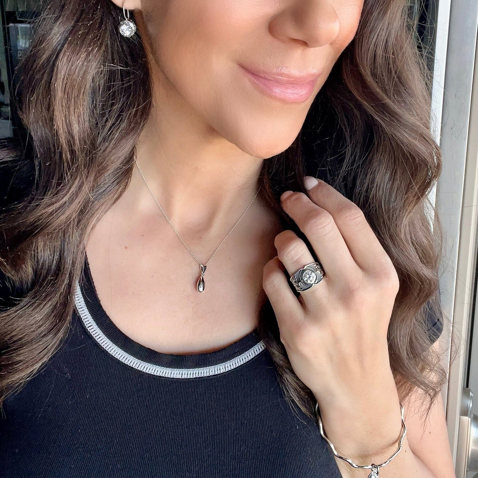 Tropix Ring paired with sterling silver CZ jewelry