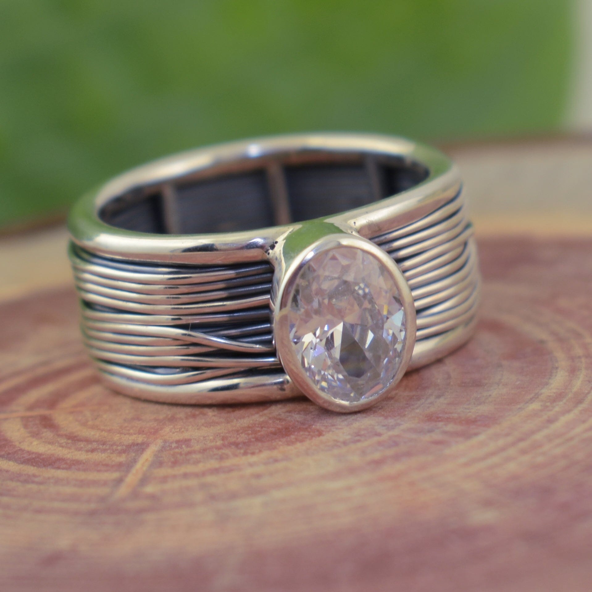 .925 sterling silver designer ring with oval shaped cz stone