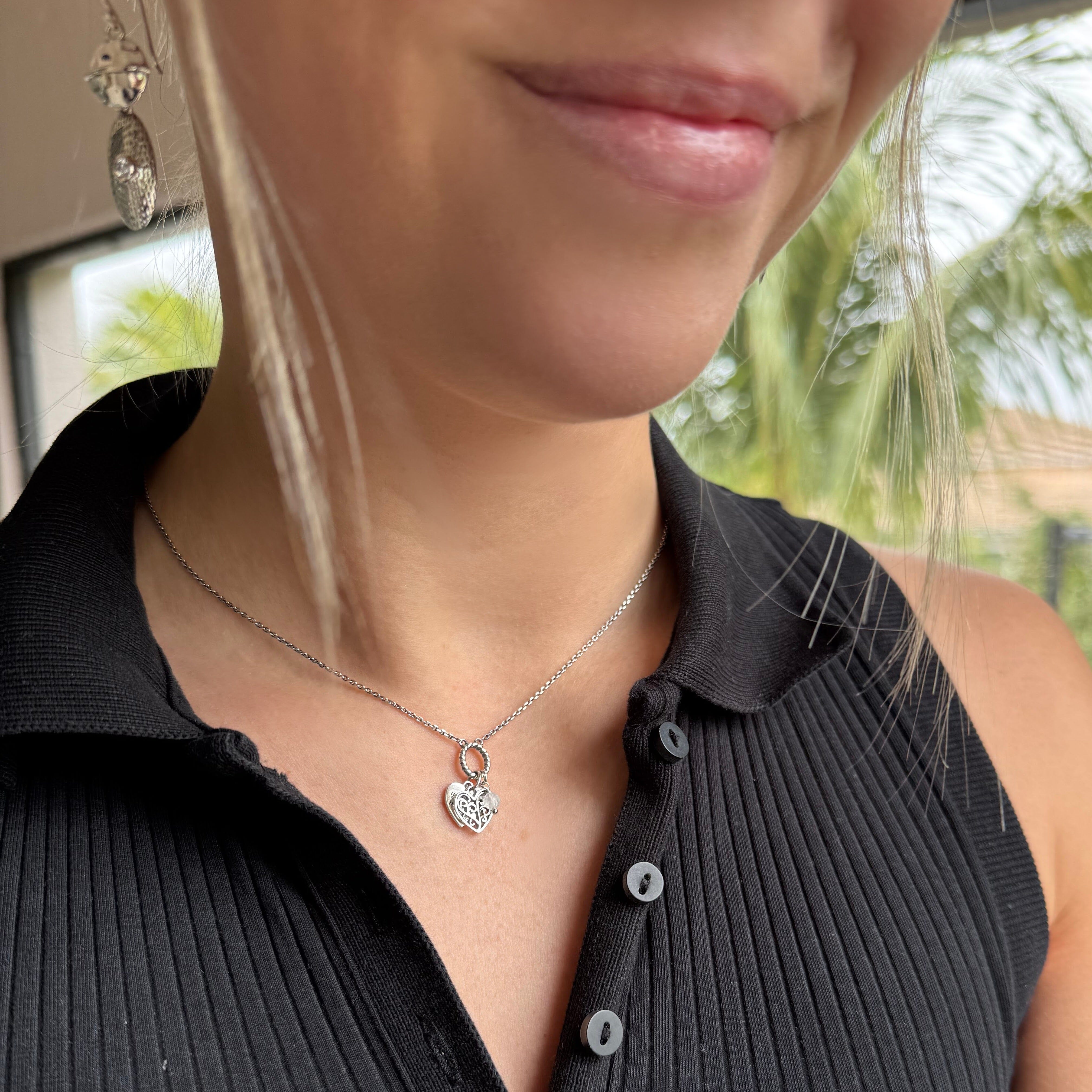 sterling silver necklace with a hear charm with the saying you have my heart engraved