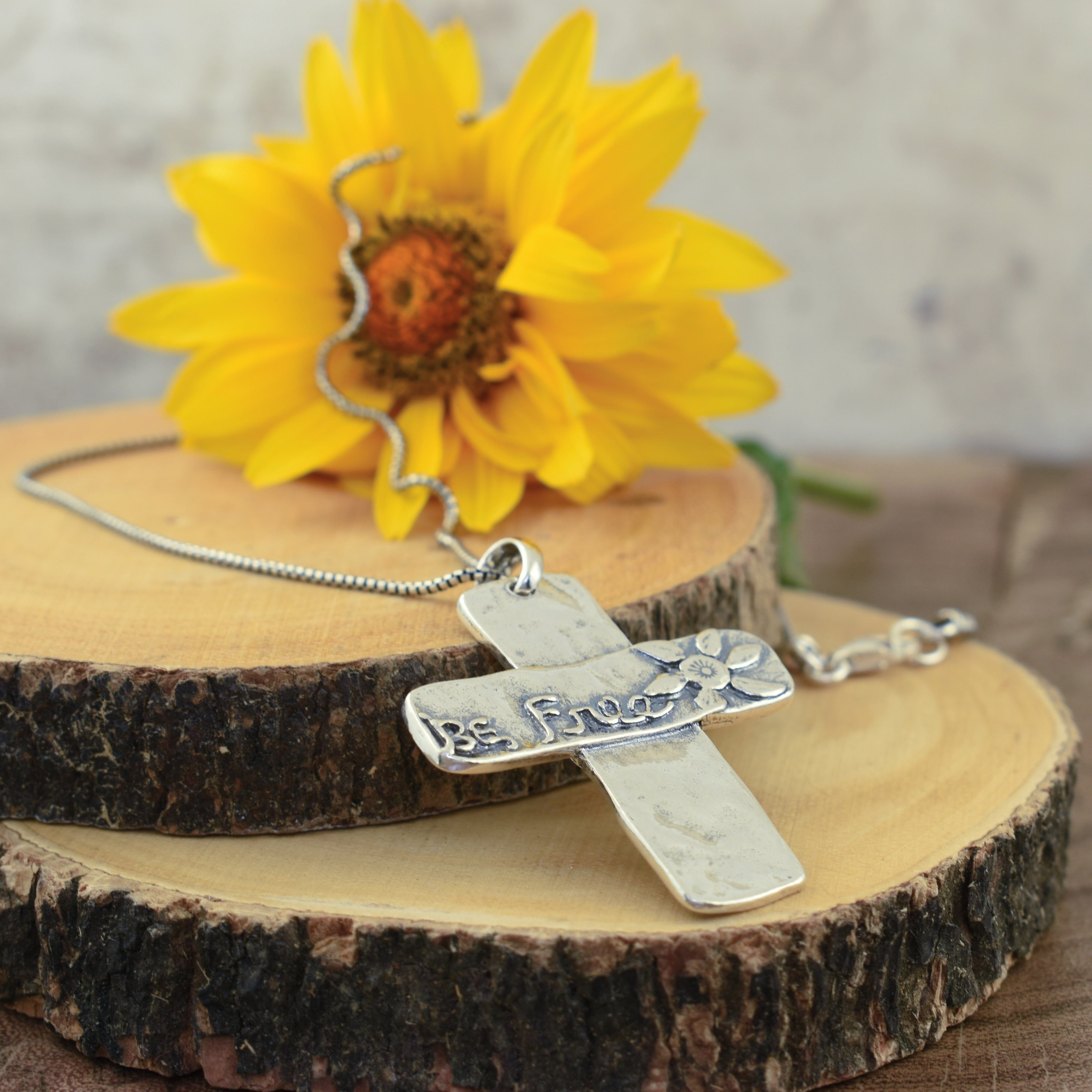 chunky cross necklace that says be free