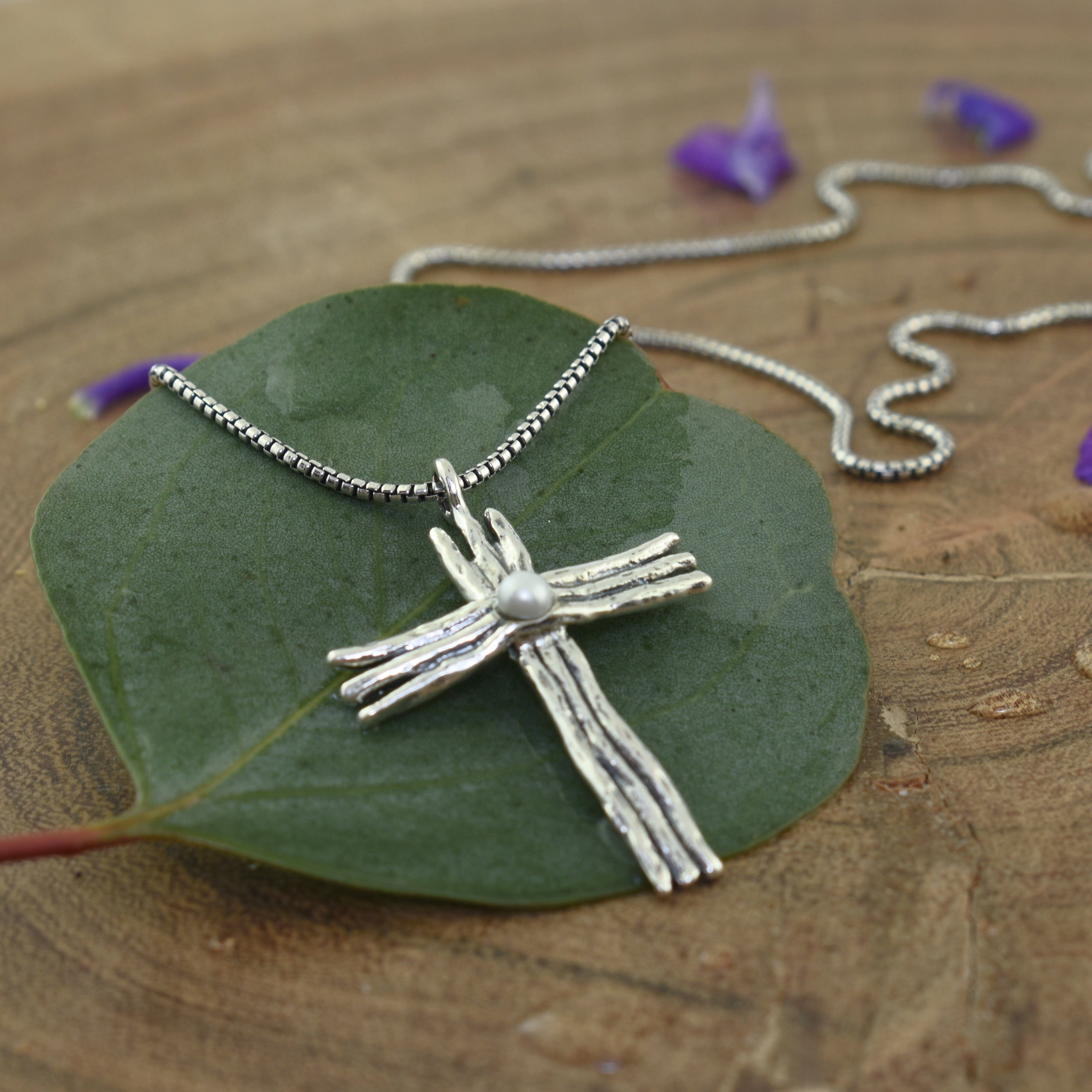 organic cross necklace featuring freshwater pearl