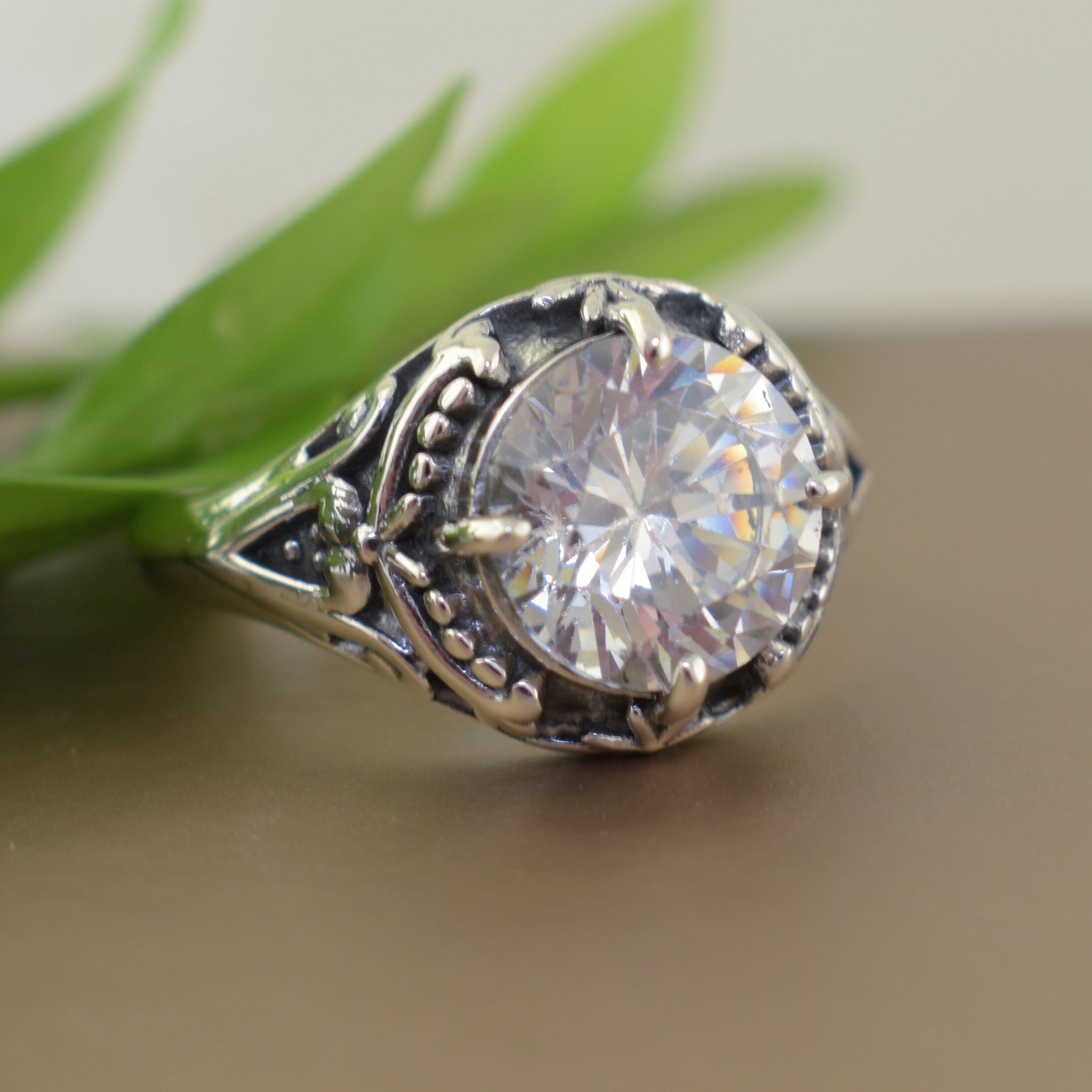 Vintage-style sterling silver ring with clear round CZ stone