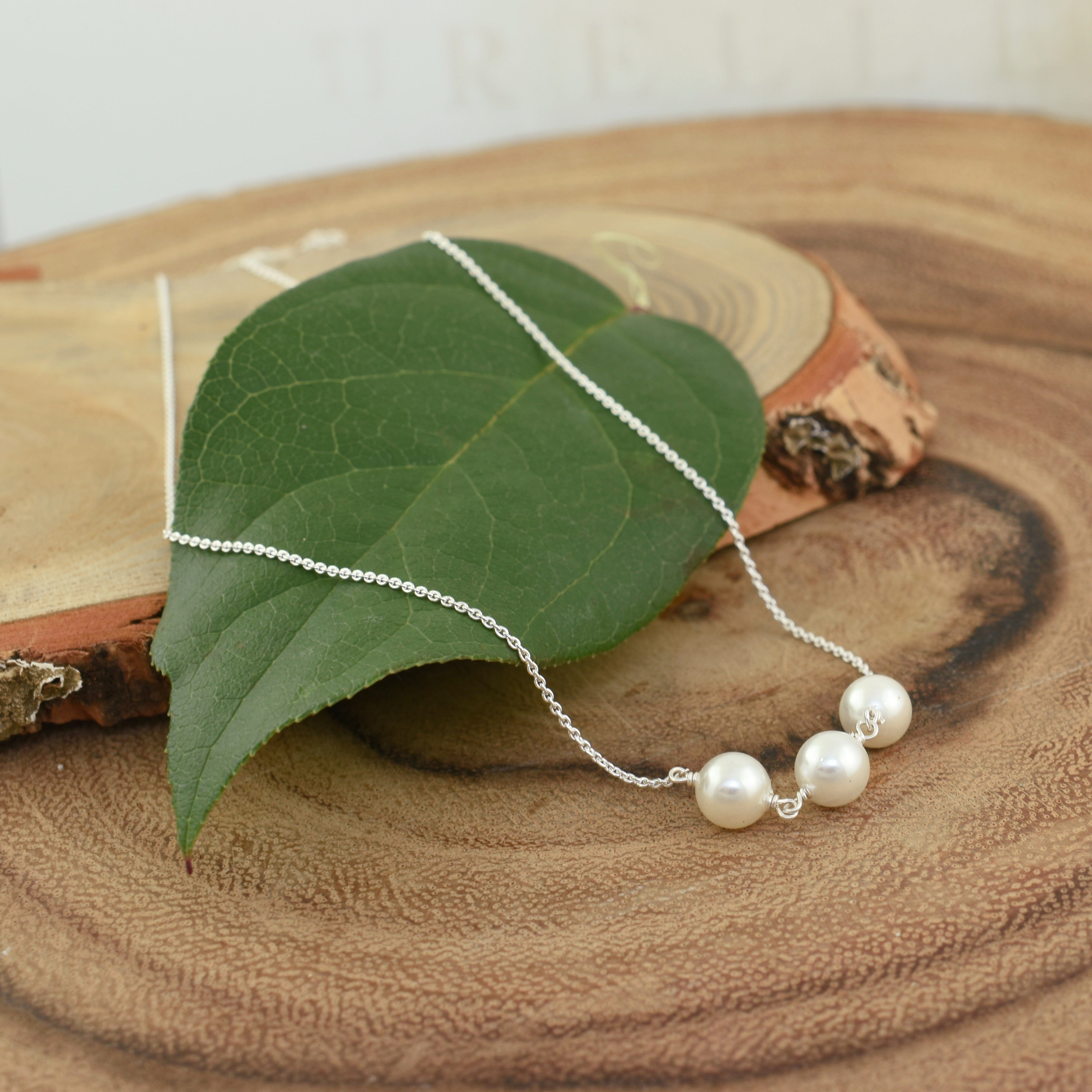 sterling silver minimalist style necklace with three freshwater pearls