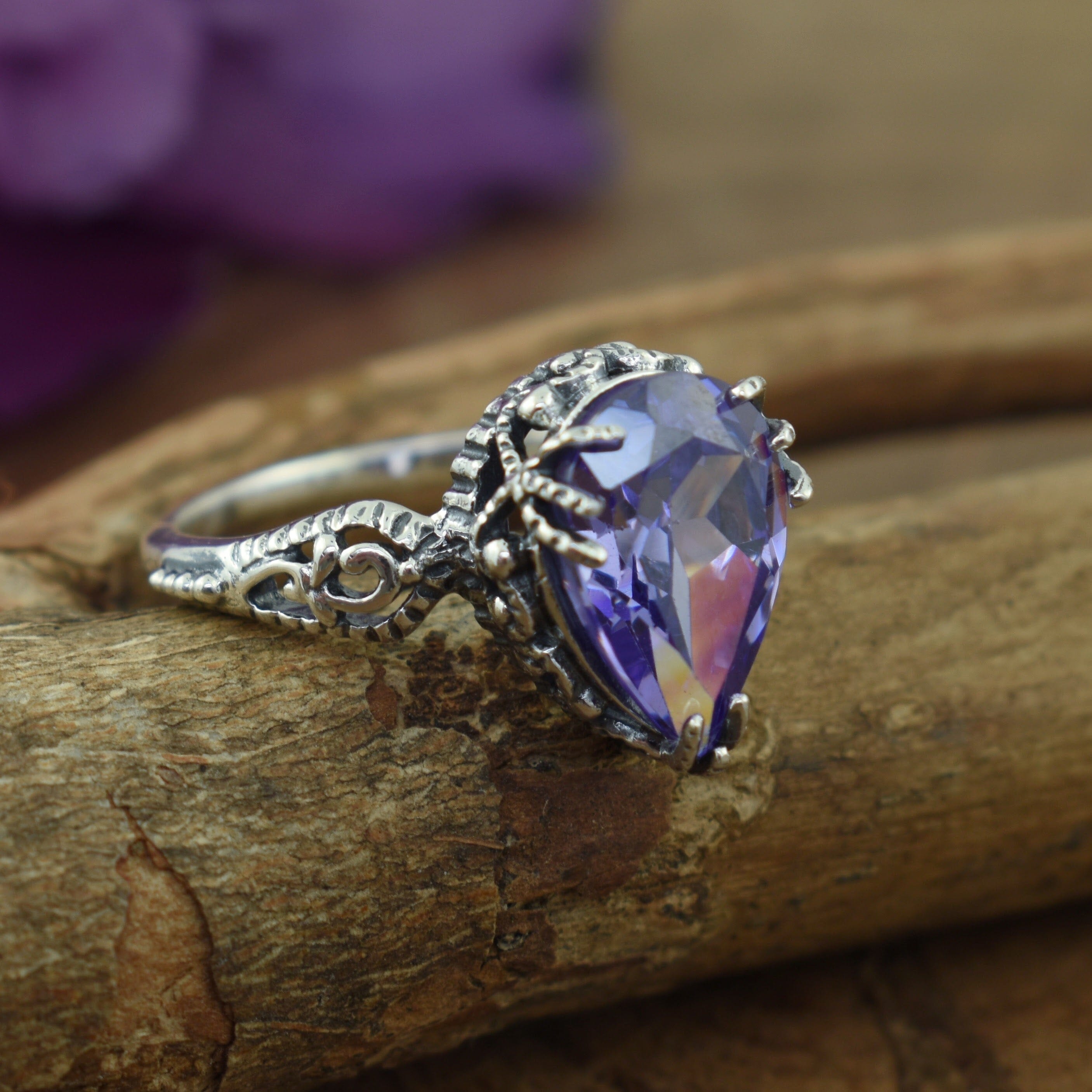 Lavender CZ stone ring with sterling silver setting 