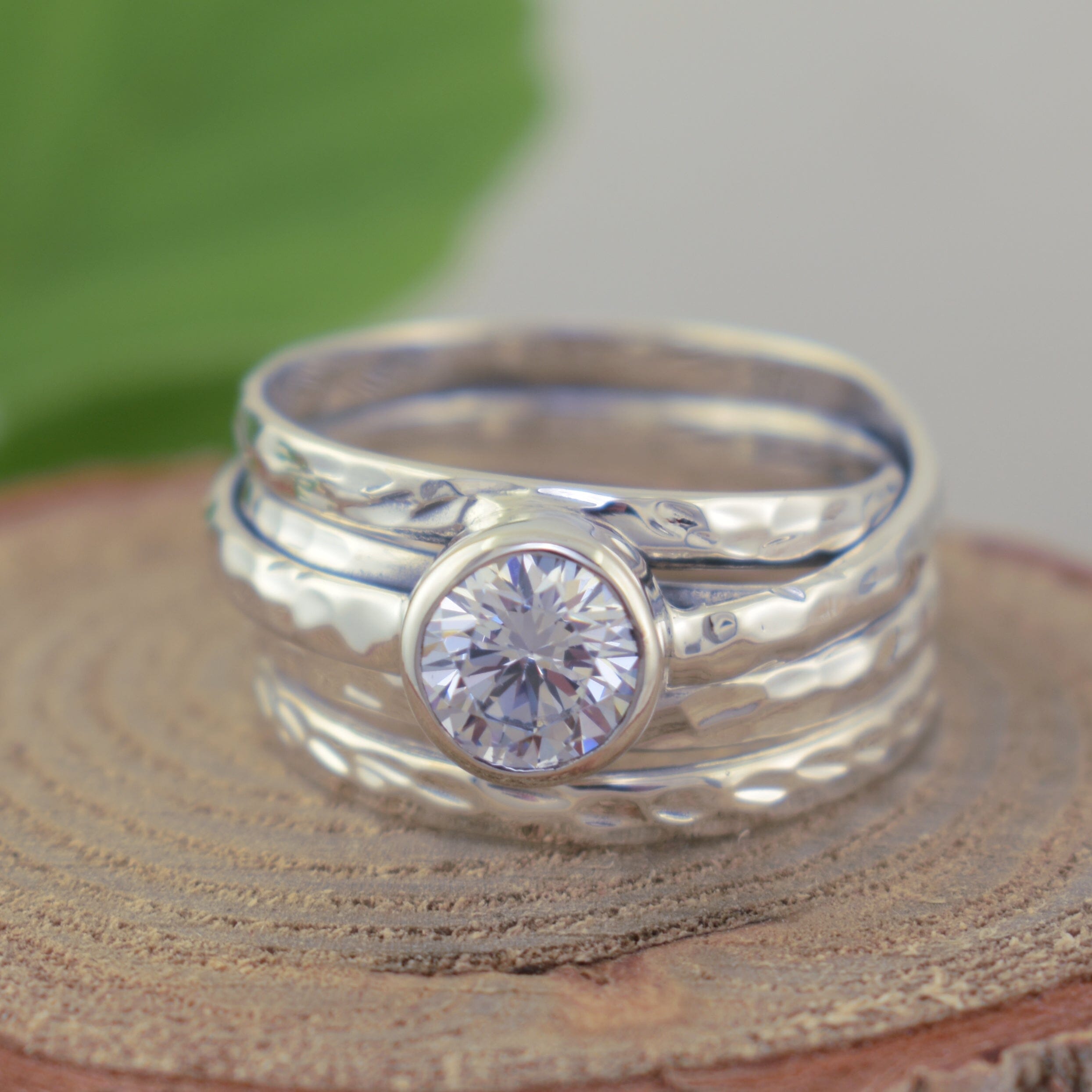 High polished .925 sterling silver wide band ring featuring round cz stone