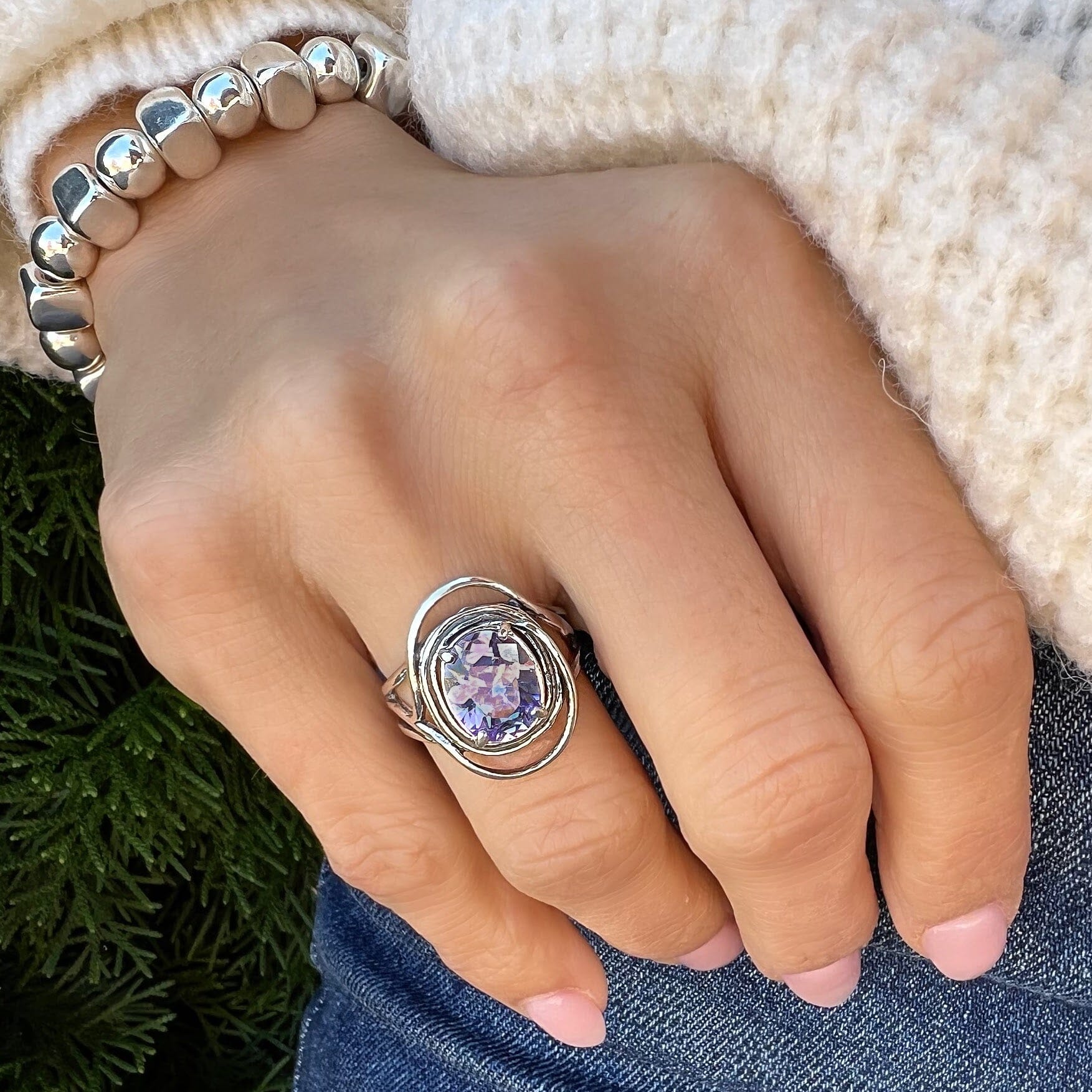 sterling silver free form ring with oval lavender Cz center