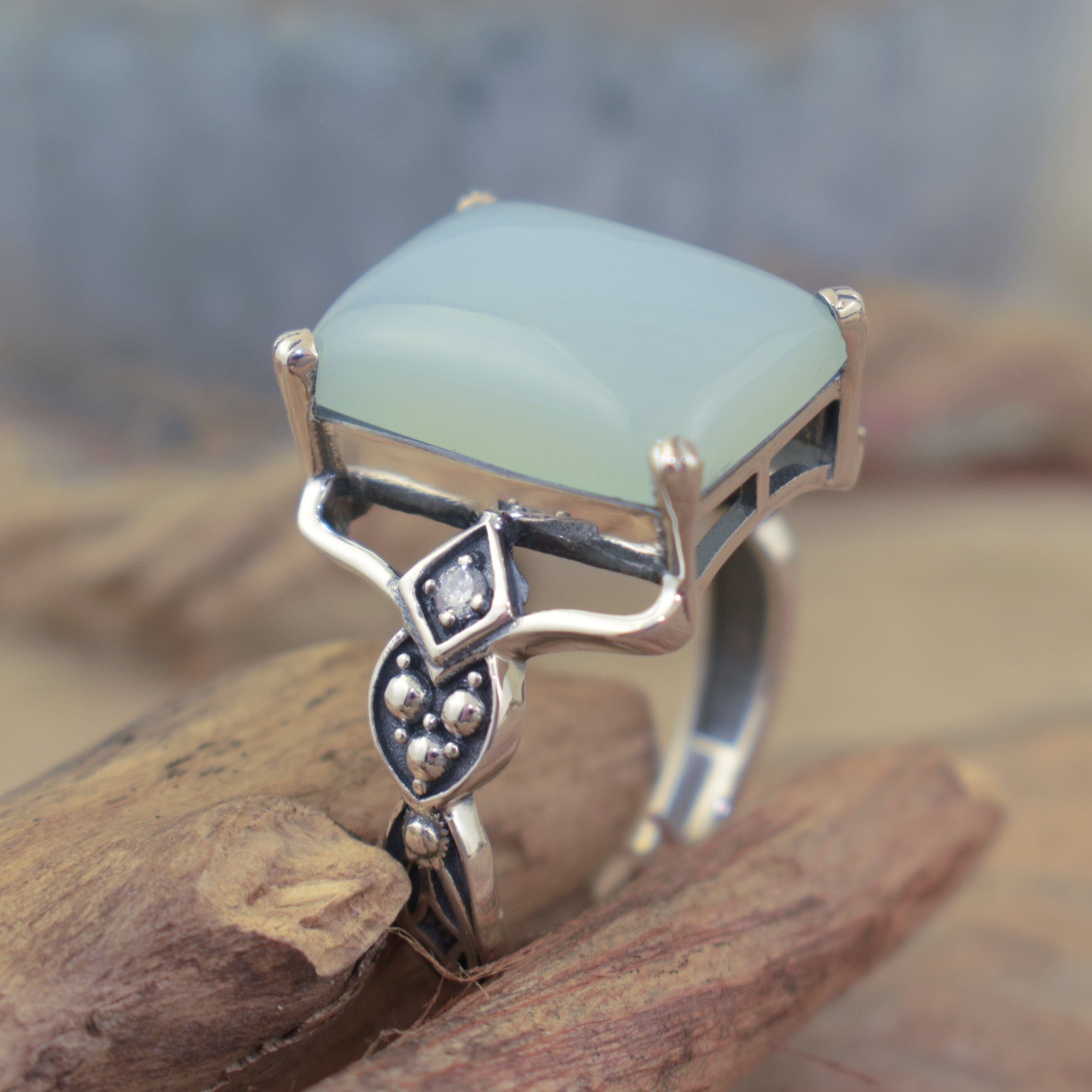 Designer sterling silver ring featuring chalcedony and CZ