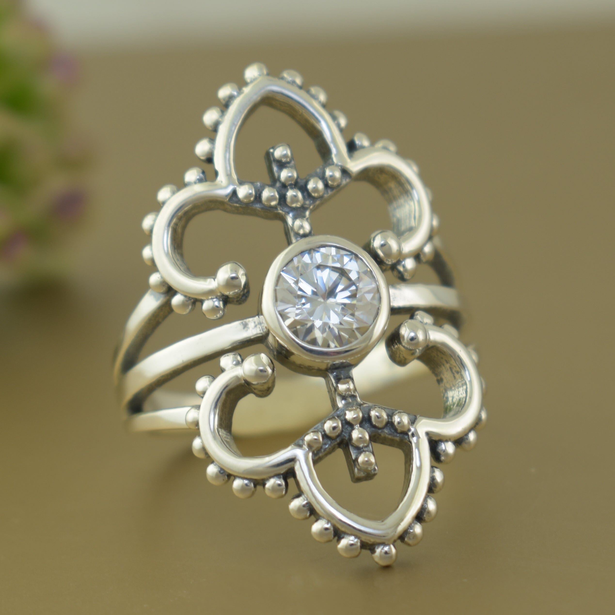 Bali-inspired sterling silver ring featuring center clear cubic zirconia stone