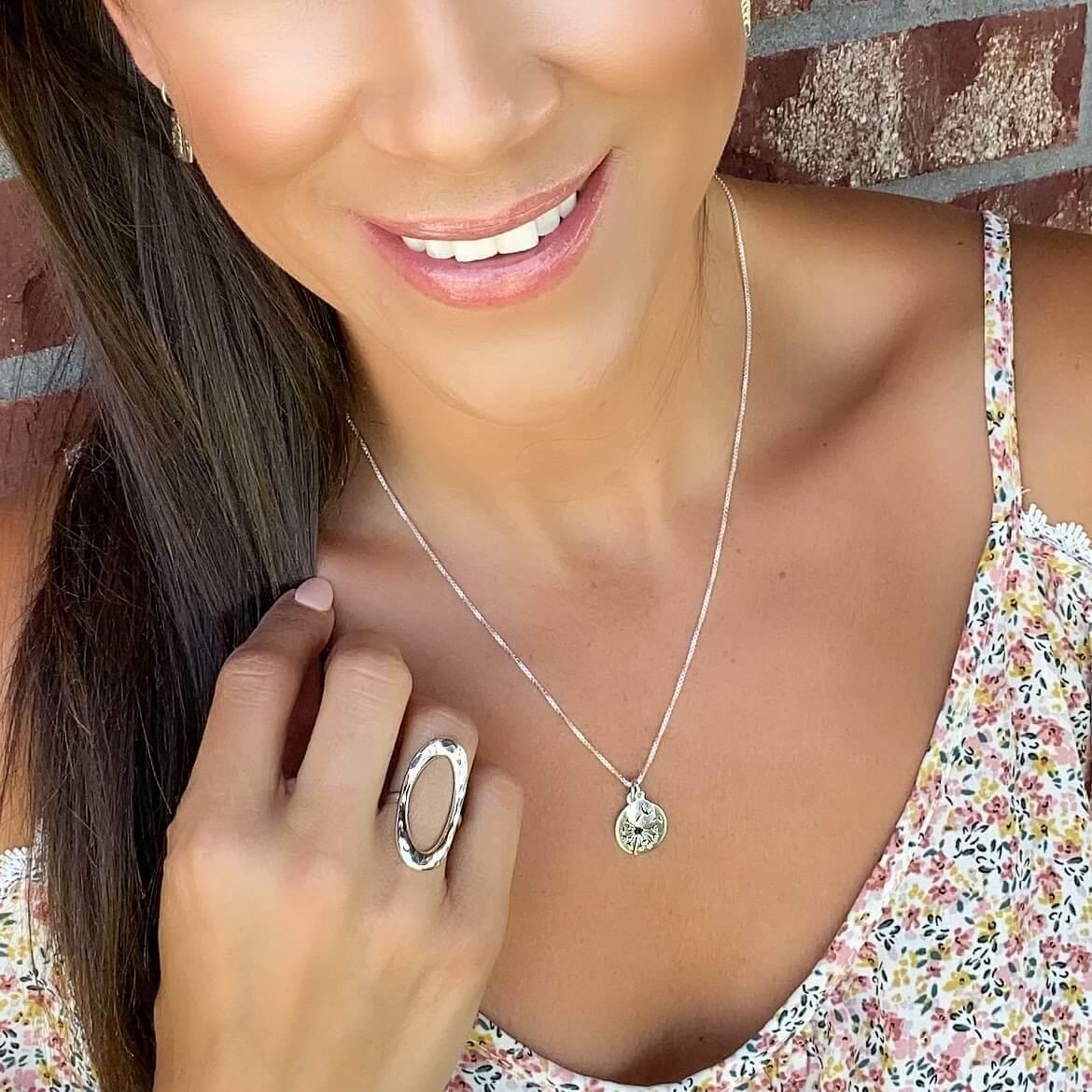 Letting Go Necklace in sterling silver paired with Tree of Life Earrings and Ramble Ring