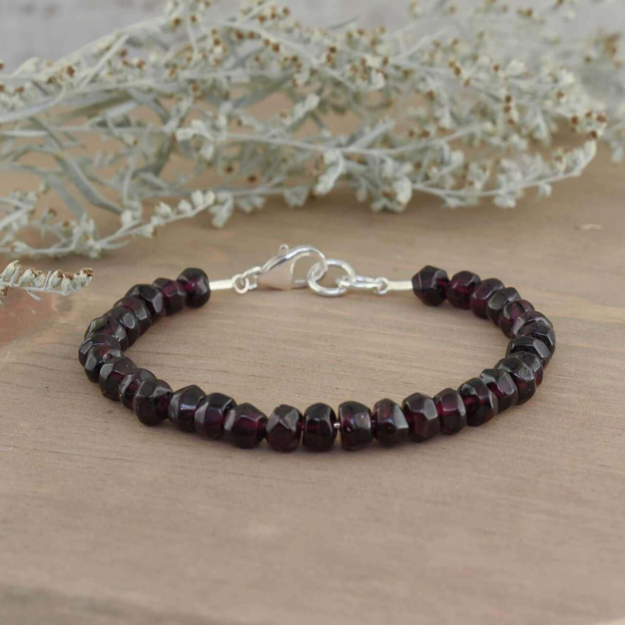 Put'n on the Glitz Bracelet in sterling silver and genuine garnet stones