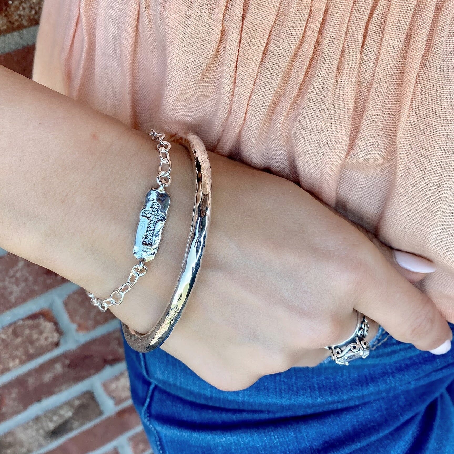 Essentials Bangle stacked with The One Bracelet