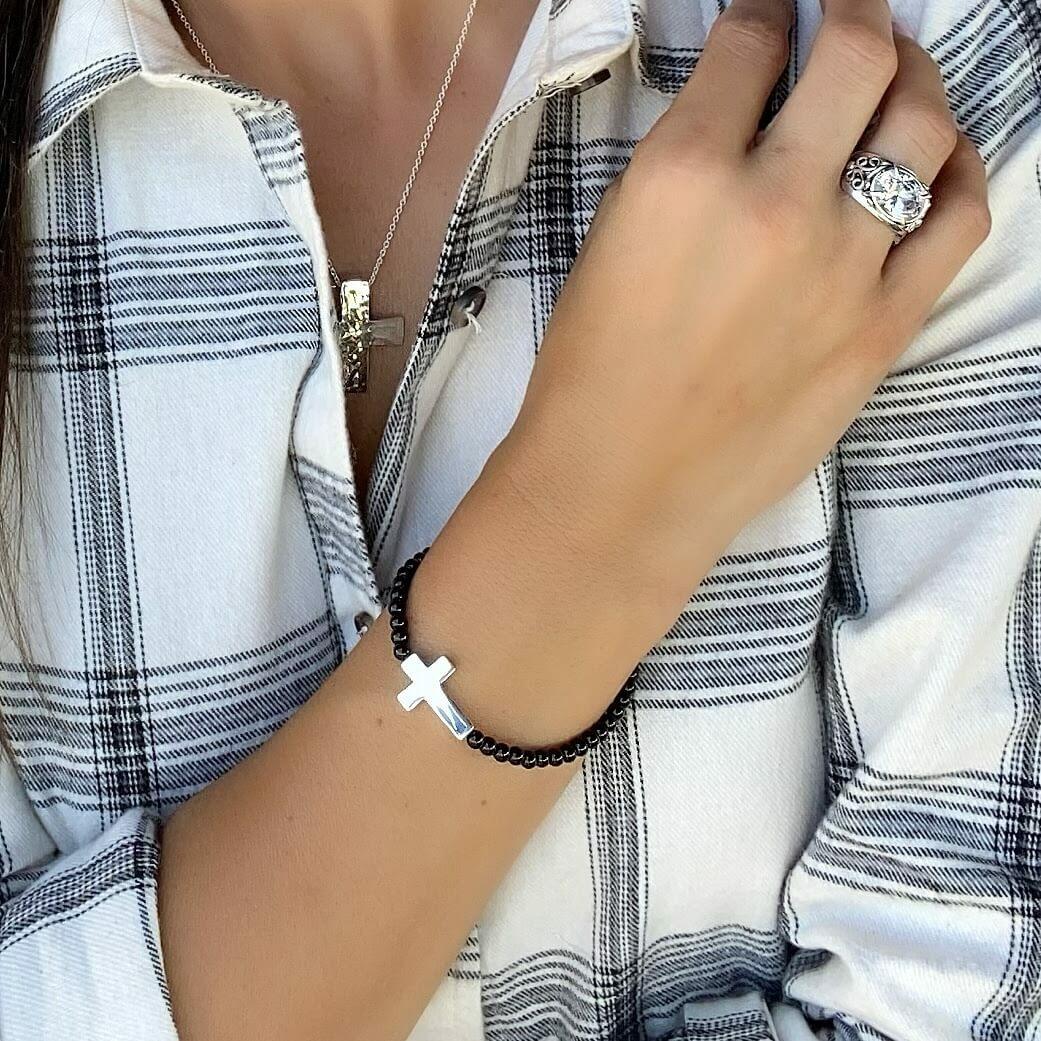 Designer bracelet with genuine onyx beads and .925 sterling silver cross