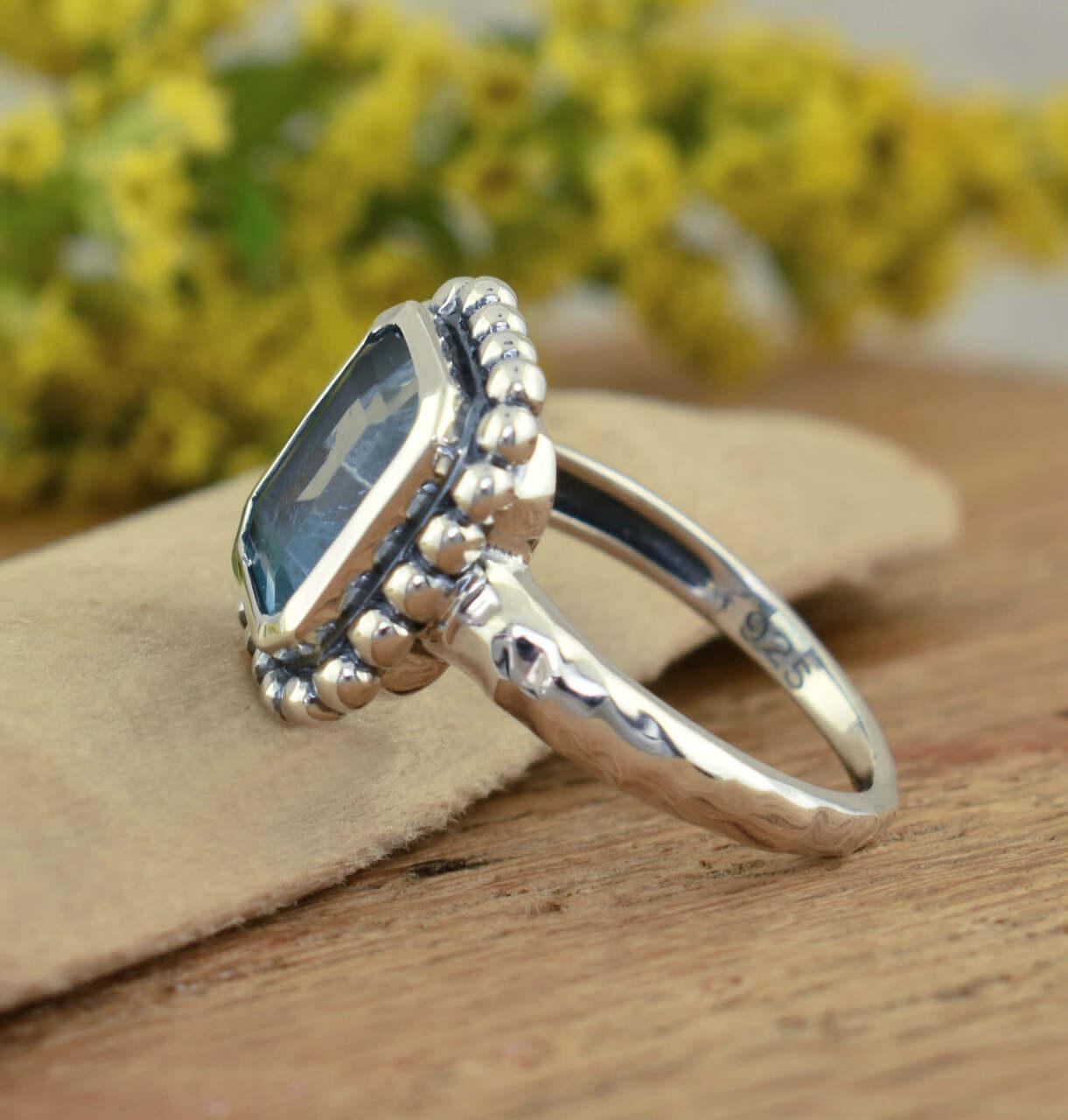Statement sterling silver ring with blue cubic zirconia