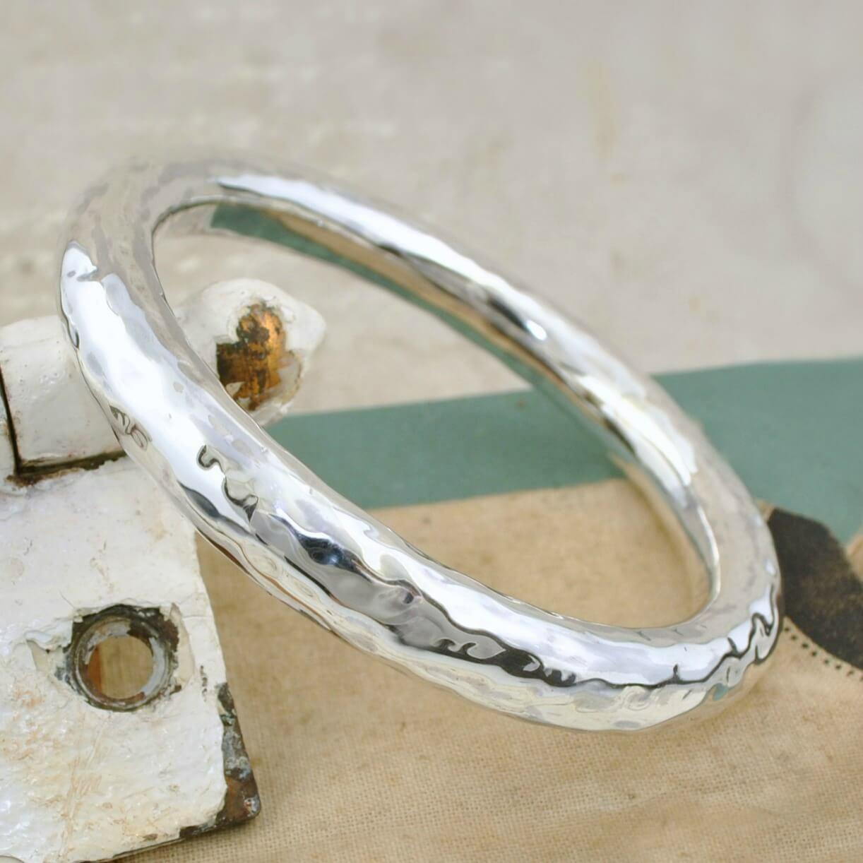 Hammered Bliss Bangle Bracelet made of handcrafted .925 sterling silver.  Large Hammered Bangle.