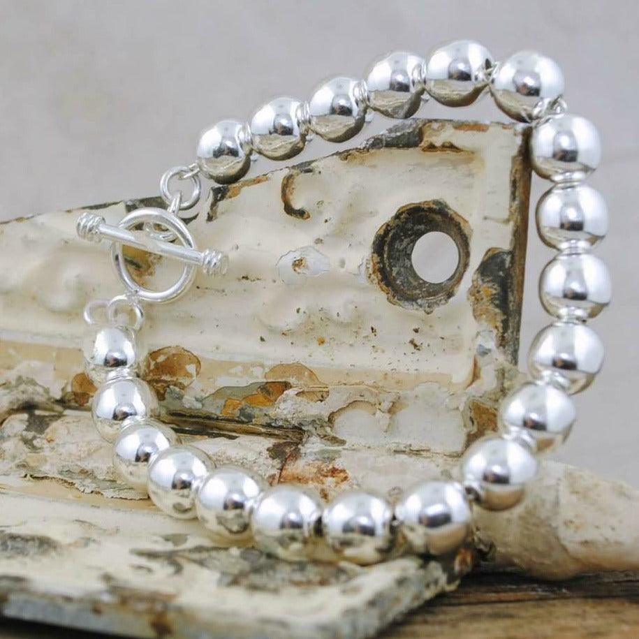 .925 sterling silver ball bracelet with toggle closure