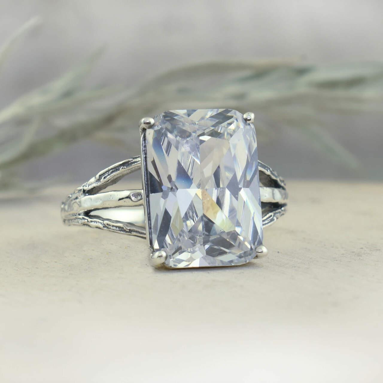 Handcrafted sterling silver ring with large emerald cut CZ stone