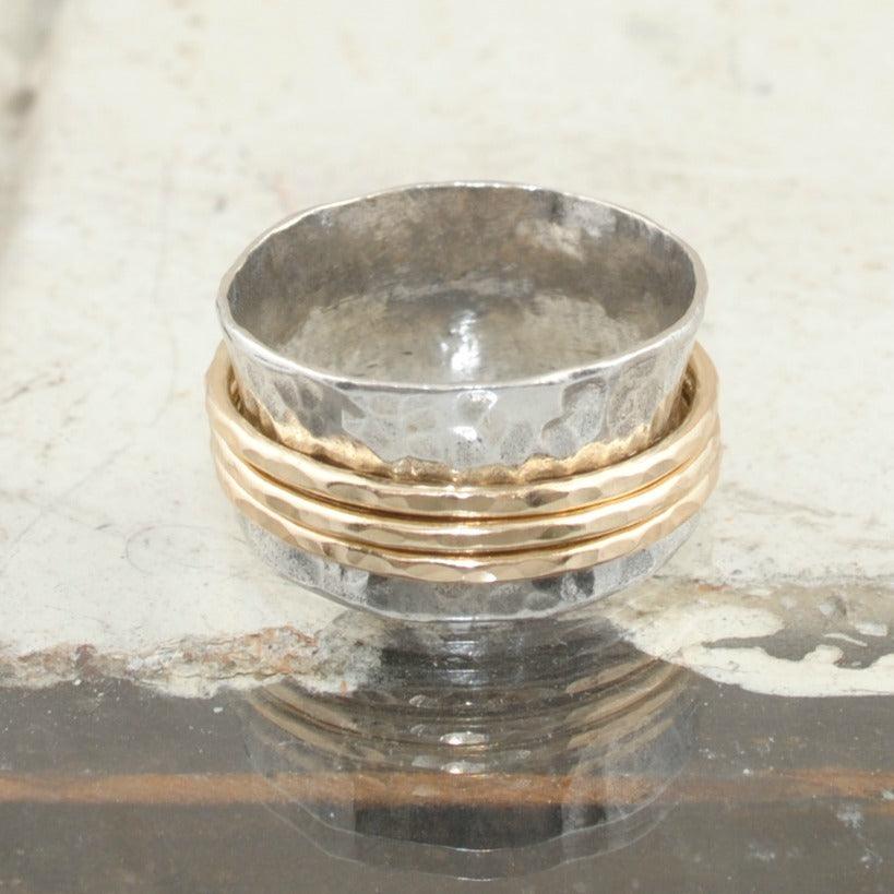 Hammered sterling silver ring featuring 3 gold filled bands