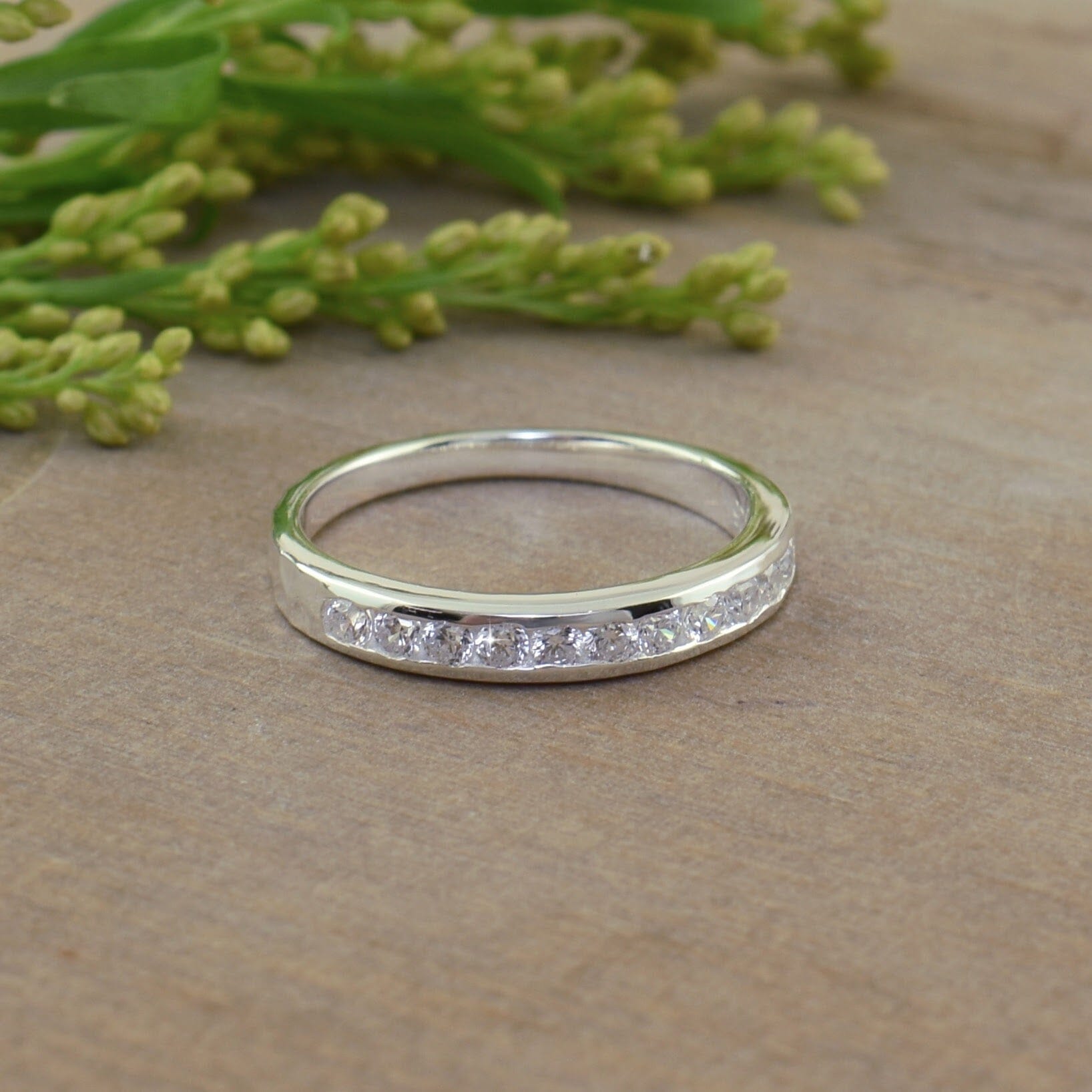 dainty .925 sterling silver band featuring cubic zirconia