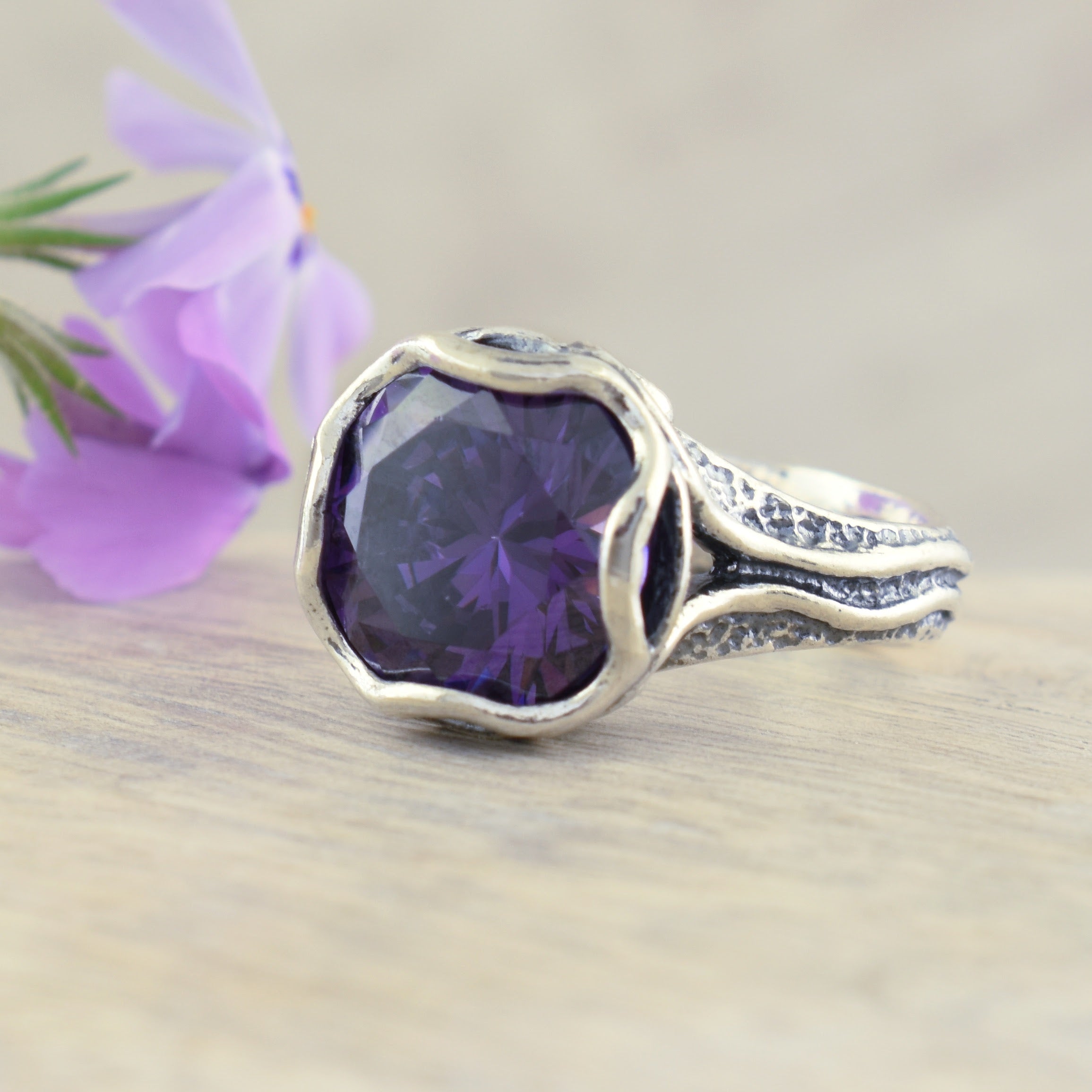 Plum Perfect Ring featured in .925 sterling silver and amethyst cz