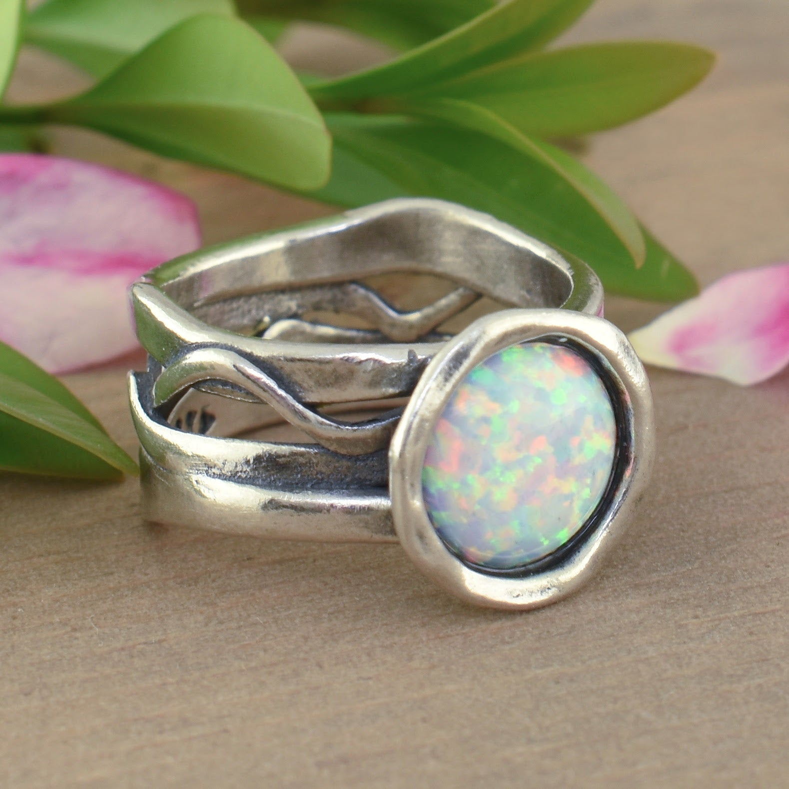 wavy wide band ring with reconstructed opal 