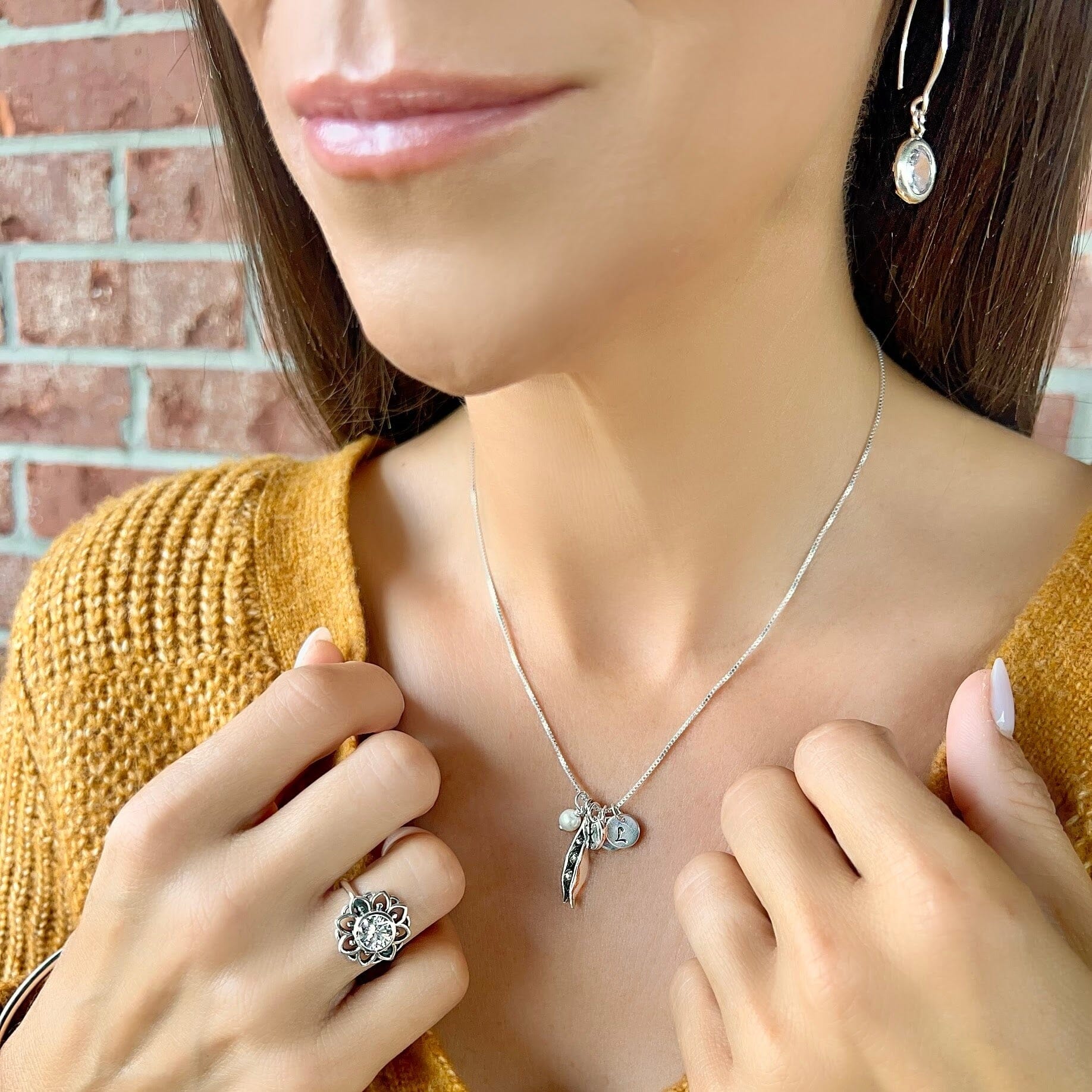 3 peas in a pod necklace paired with good day sunshine ring and shine like silver earrings