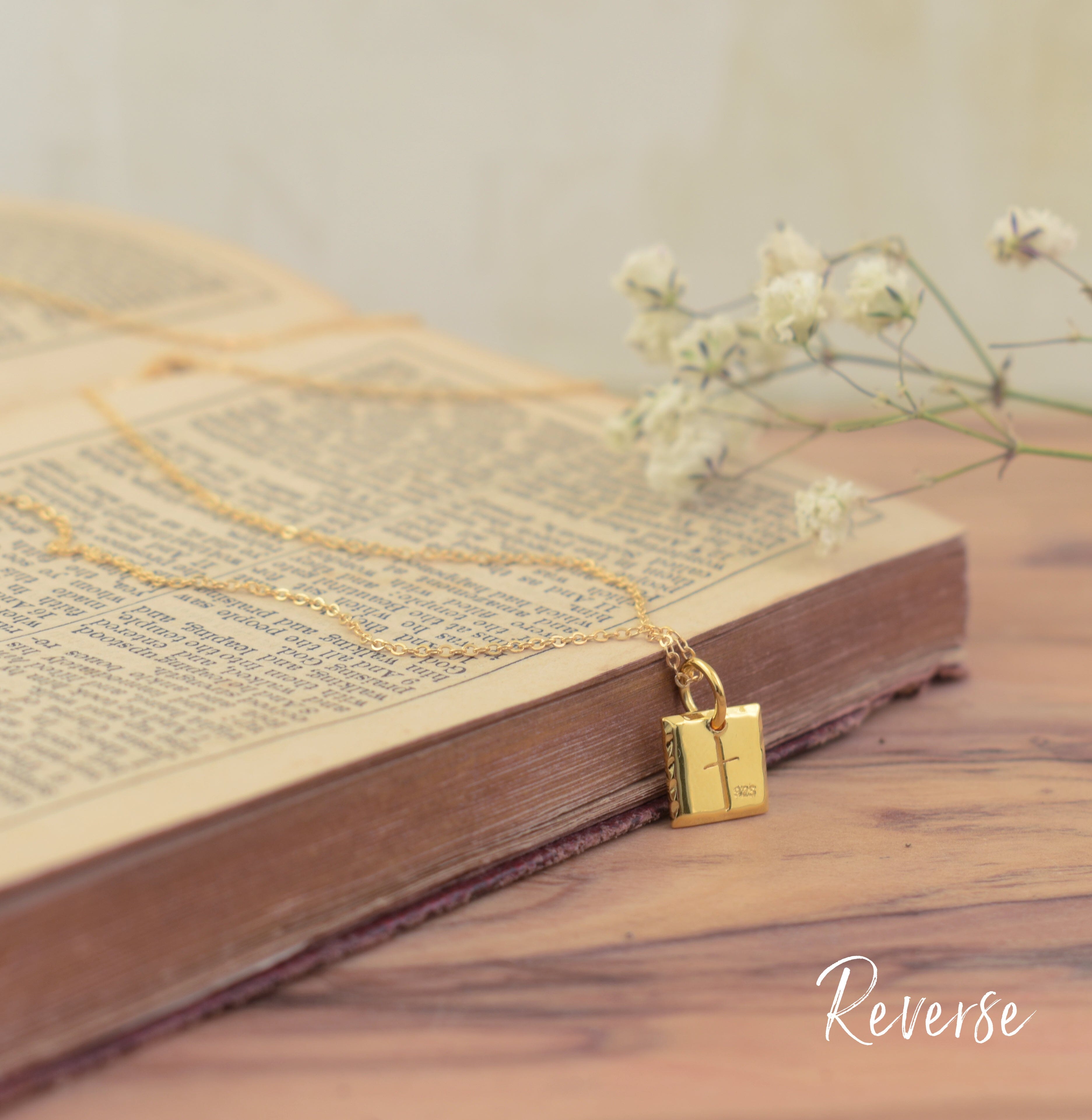 gold plated engraved 41 necklace with a cross on the back of the pendant