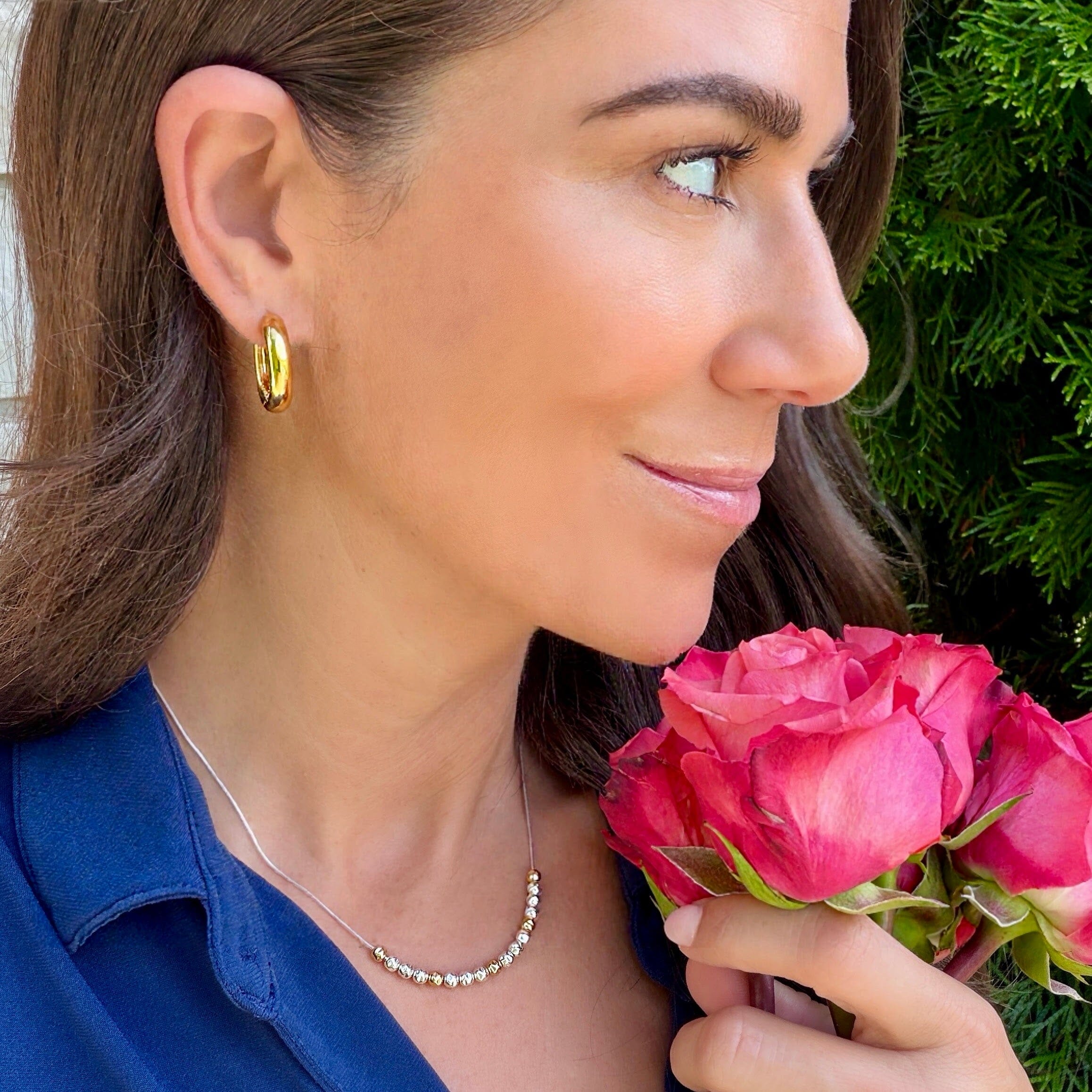 high polished After Hours Huggie Earrings in a gold plated finish
