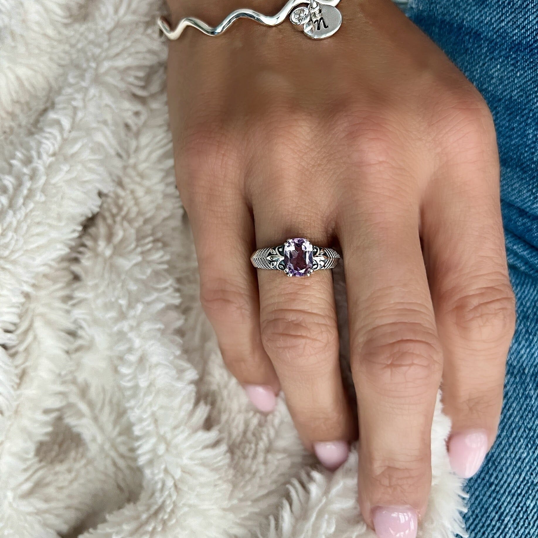 Antoinette ring featuring an oval amethyst cz